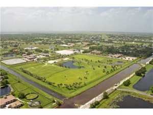 PRIME LOCATION ADJACENT TO GRAND PRIX VILLAGE WITH MANY UPGRADES. TREE LINED PROPERTY IS FULLY IRRIGATED WITH SERENE LAKE AND BOAT DOCK, SAND ARENA AND ONE OF A KIND INTERNATIONAL GRAND PRIX FIELD W/ WATER JUMPS, LIVER POOLS, BANK JUMPS AND MANY OTHER NATURAL OBSTACLES. SPRINKLER SYSTEM, WATER, ELECTRIC AND DRAINAGE ARE INSTALLED WITH BUILDING PAD IN PLACE. READY TO BUILD YOUR DREAM BARN AND HOUSE! 15134 NATURES POINT IS INCLUDED IN PRICE.