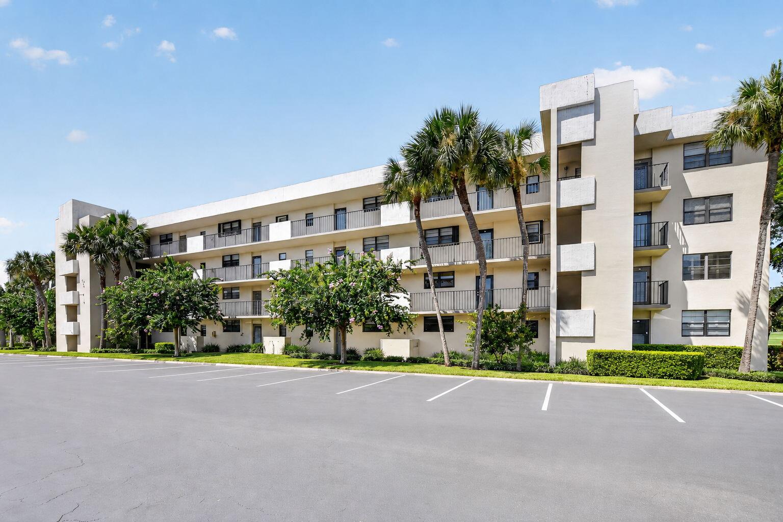 Second-floor 1-bedroom, 1.5-bath condo in The Palms of Deer Creek featuring a spacious layout and screened-in balcony. The kitchen offers granite countertops and a peninsula with bar seating, opening to the living and dining areas. The large primary suite includes a custom walk-in closet, and the unit features an in-unit washer and dryer for added convenience. Additional highlights include an assigned parking space and a private storage unit. Residents enjoy access to a clubhouse, community pool, tennis courts, and pickleball. Conveniently located near shopping, dining, major highways, and Deerfield Beach.