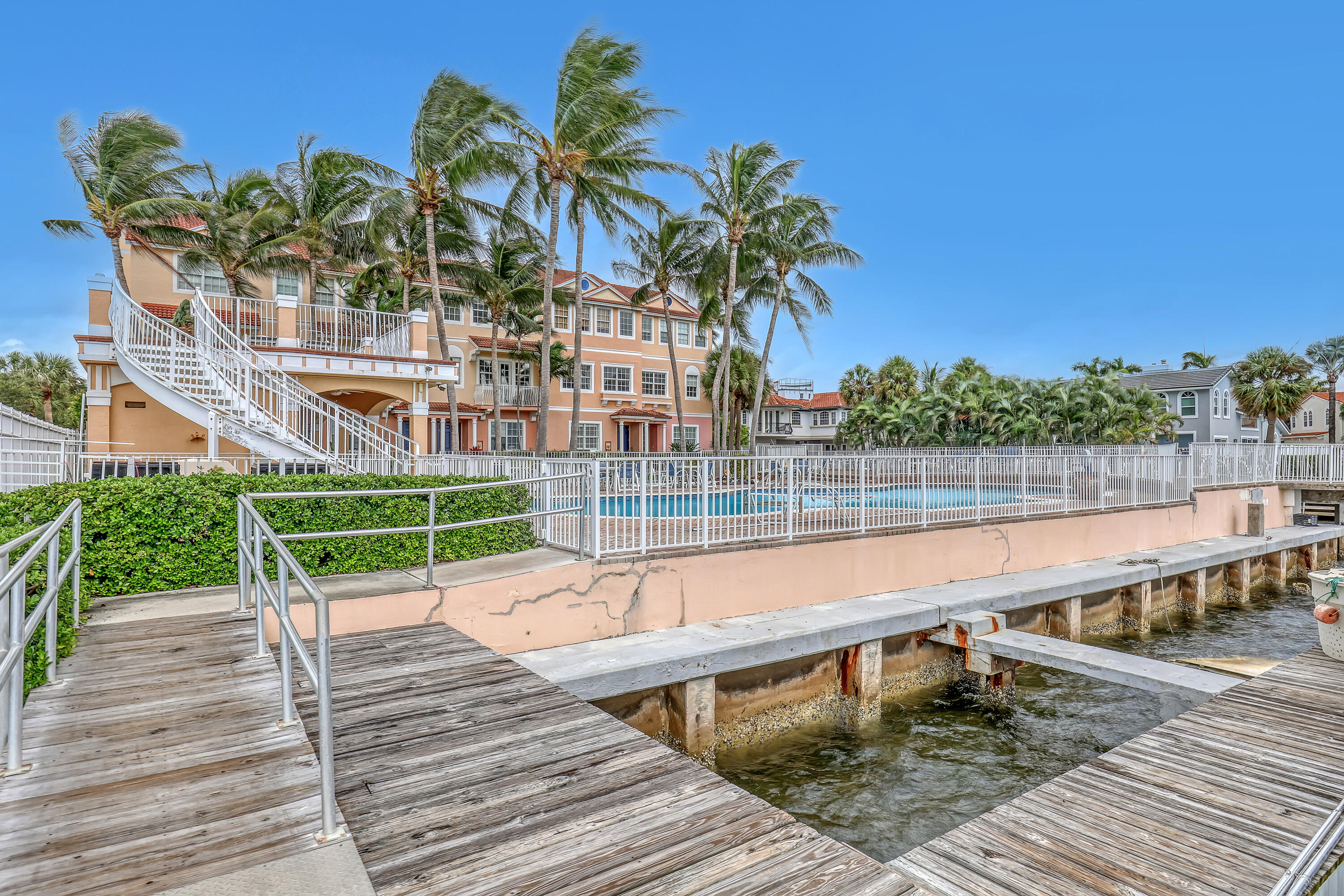 Experience the ultimate in waterfront living—complete with your very own private boat lift! This luxurious 3-bedroom, 2.5-bathroom townhome with a spacious office is now available for annual rent. Perfectly positioned along the Boynton Inlet and just minutes from Beer Can Island, this residence includes a 20,000 lb private boat lift—a rare find and a true boater's dream. Enjoy sunlit living spaces with high-end finishes, elegant design, and a seamless flow to a gourmet open-concept kitchen featuring top-of-the-line appliances and stunning water views—ideal for entertaining.
The beautifully maintained community offers lush landscaping, proximity to upscale dining and shopping, and easy access to major highways.
Don't miss this rare opportunity to lease a waterfront home where luxury meets lifestyle, complete with your own private boat lift. Schedule your private tour today!