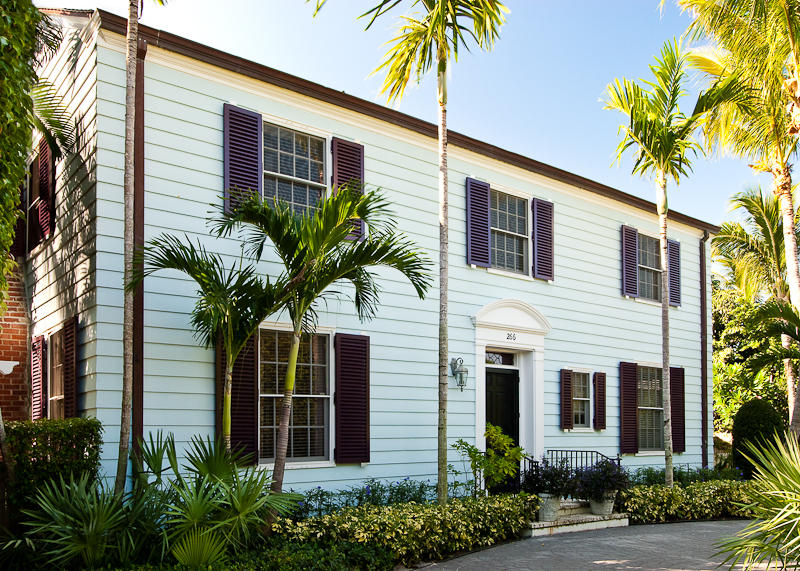 Maurice Fatio designed Monterey Colonial on an oversized lot is enveloped in lush gardens & beautiful dining gardens. Cabanas can serve as guest suites, a large old fashioned coral framed pool welcomes family and friends. Gracious room sizes, great ceiling heights, formal dining room opens to the gardens, gourmet gas kitchen, the house is naturally lit with lots of southern exposed glass porches.  A large heated pool with cabana, garage, full house generator complete this offering.