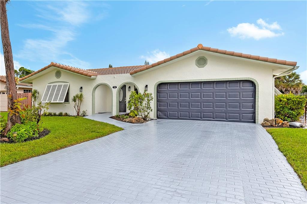 Looking for a home that can handle a large Multigenerational family that has been completely remodeled? You found it!! This beautiful home has a BRAND NEW roof, new flooring, new paint inside & out, new lighting, updated kitchen, electrical, bathrooms... AND a true MOTHER-IN LAW QUARTERS w/ it's own Living Room, kitchenette, bedroom, large Walk-In Closet & private bathroom. The Master Bedroom has a large Walk-In Closet with Built-Ins & a doorway to the 2nd bedroom which is great for a nursery, office, or even as a Sitting area for the Master Bedroom or it could be closed off for more privacy. You won't find another home like this! The Sellers spared no expense getting it ready for the new Owners. All measurements are approximate. This home won't last. Call today to schedule your Showing.