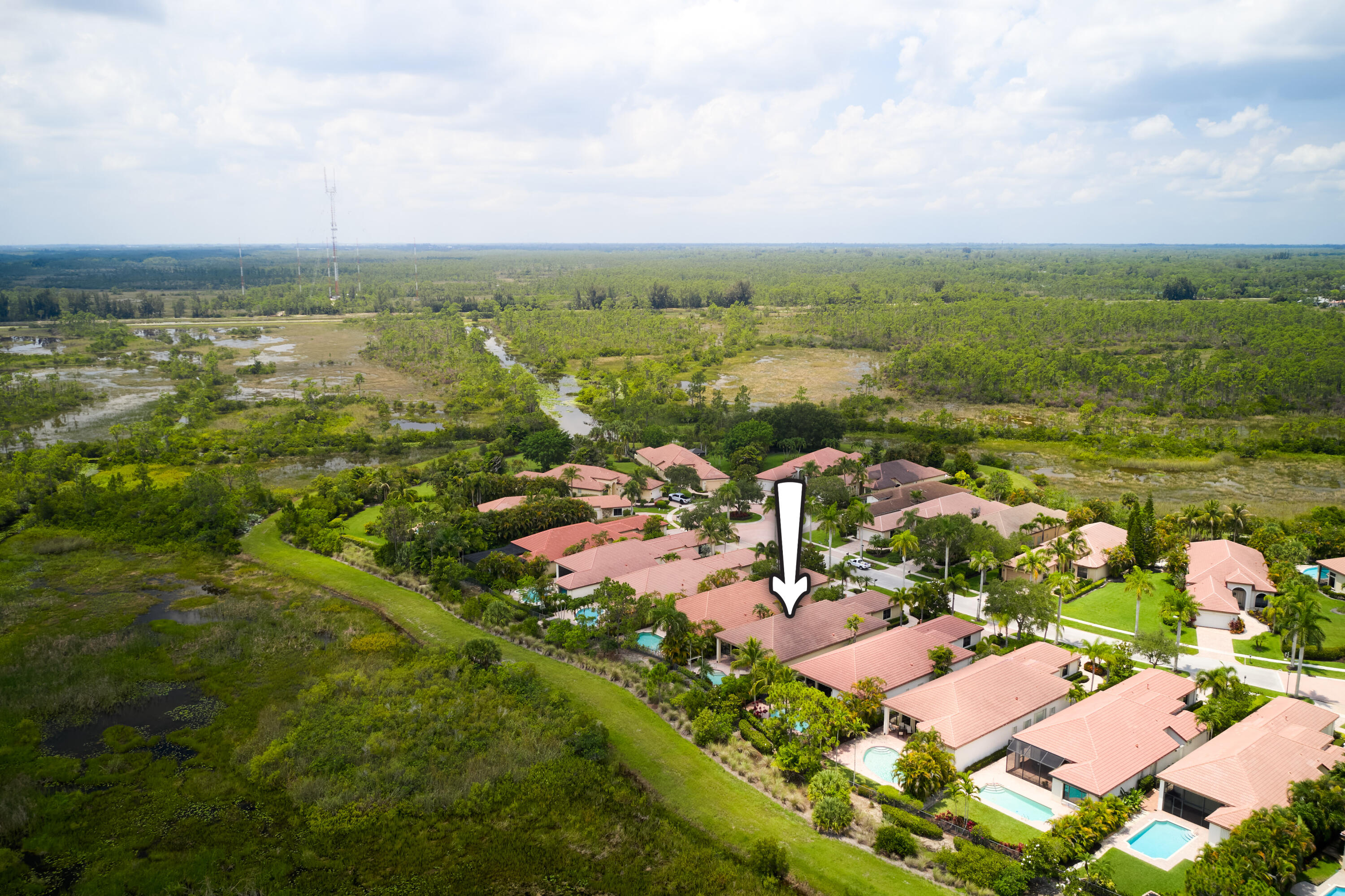 Bright and spacious, this well-maintained home offers soaring ceilings, abundant natural light, and a desirable split floor plan with a dedicated office and three en-suite bedrooms. The open kitchen overlooks the family room and flows seamlessly to the covered lanai, freeform pool, and expansive brick paver patio. Private preserve views framed by lush tropical landscaping create a peaceful, serene backdrop with no rear neighbors. Recent updates include a new A/C (2024), water heater (2023), and a Roof Maxx roof treatment (2024). An exceptional opportunity to enjoy one of the community's most private settings while adding your own personal touches.