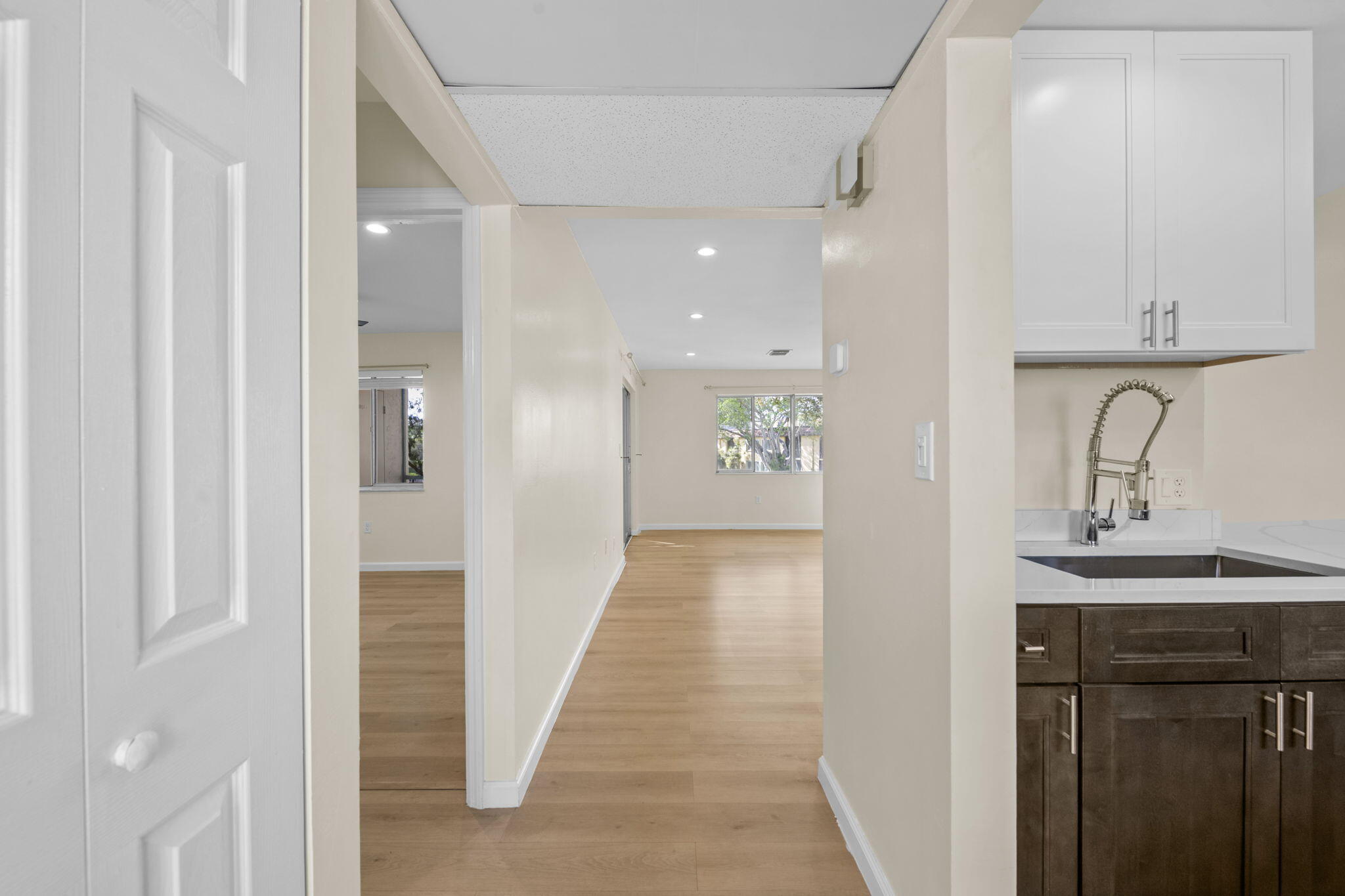 Step into this beautifully remodeled 1/1 in the heart of Central Boca! From the moment you walk in, you'll notice modern upgrades that make this condo truly shine. The kitchen features sleek stainless steel appliances, while neutral flooring throughout the unit adds a polished, contemporary touch.  The convenience of an in-unit washer and dryer makes everyday living a breeze in this well-appointed space. Situated in an all-ages community, you are perfectly positioned to enjoy everything Boca Raton has to offer. Spend your weekends exploring the upscale shops and dining at Mizner Park, visiting the Town Center Mall, or relaxing at the nearby beaches. Plus, with quick access to I-95, your commute or weekend getaway is always within easy reach. Welcome Home.