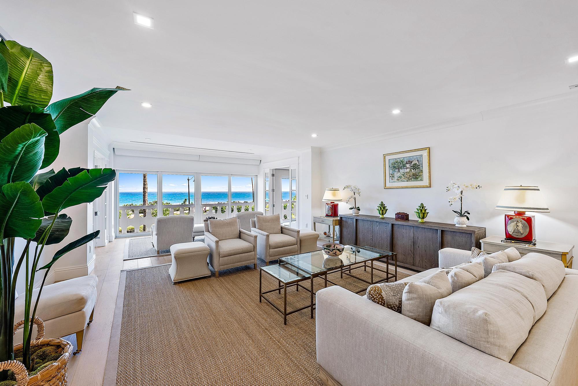 Rare ESTATE SALE midtown on the ocean in Palm Beach! Astonishing direct ocean views from this gorgeous renovated 2 bedroom, 2.5 bath residence with over 2000 square feet of living space complete with sophisticated design choices including hardwood flooring, custom built-ins and electric window treatments, gorgeous baths and kitchen. Top o f the line appliances by Subzero, Wolf and Bosch. Located near Worth Ave surrounded by the finest shops, dining and the beautiful  sandy beaches of the Atlantic Ocean at the doorstep.