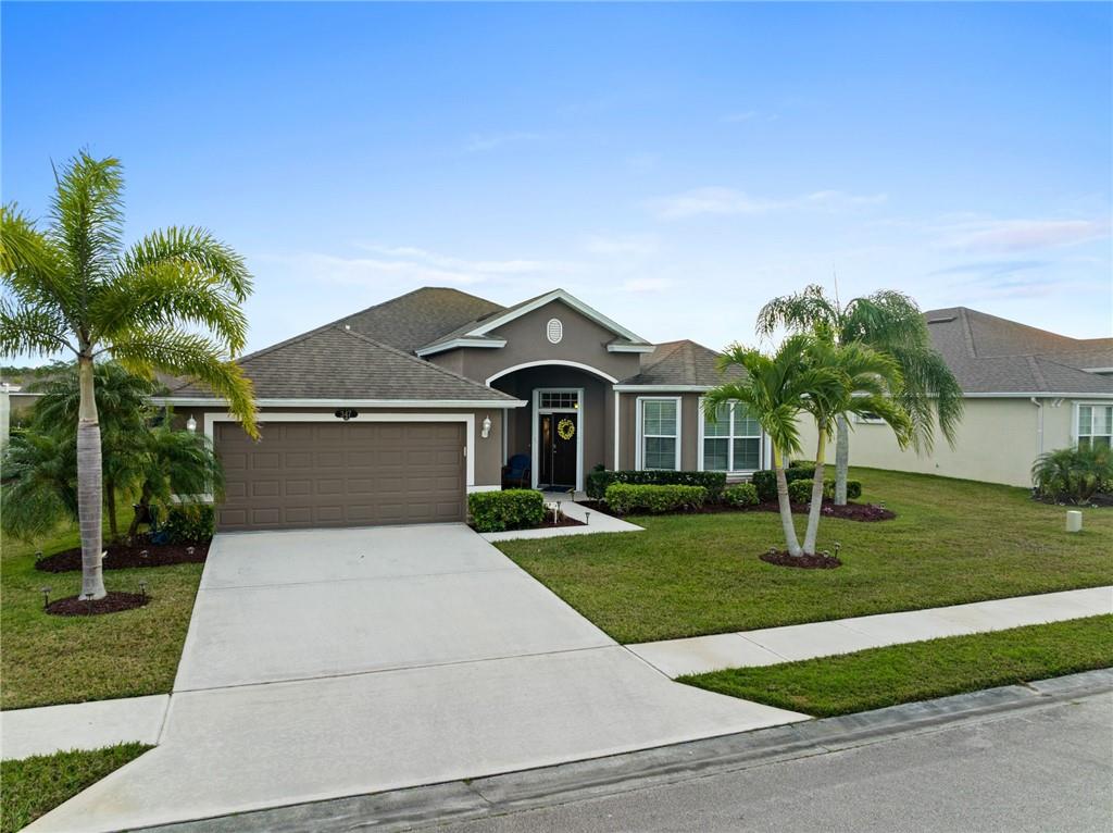 You don't want to miss this welcoming well maintained 4bdrm, 3 full bath split plan home in the gated Sebastian Crossings neighborhood.  Enjoy the lake view from your screened patio.  Large home for the whole family with granite counter and SS appliances.  Ling room which could be an office and a family room.  A whole house generator makes this a place to call home.