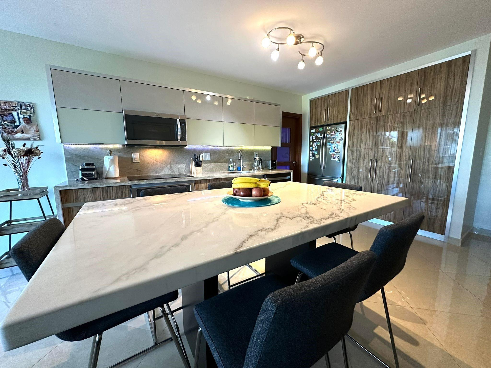 Beautifully remodeled 2-bedroom, 1.5-bath residence in the highly desirable SIAN Ocean Residences. Enjoy one of the lowest HOA fees among comparable oceanfront buildings while taking advantage of exceptional short-term rental flexibility. This bright and spacious unit features modern finishes, partial ocean views, and a turnkey coastal lifestyle. Ideal as a primary residence, vacation home, or income-producing investment property. Residents enjoy resort-style amenities, direct beach access, and one of the most investor-friendly rental policies on Hollywood Beach. AIRBNB & VRBO APPROVED! Seller will pay the current special assessment in full at closing.