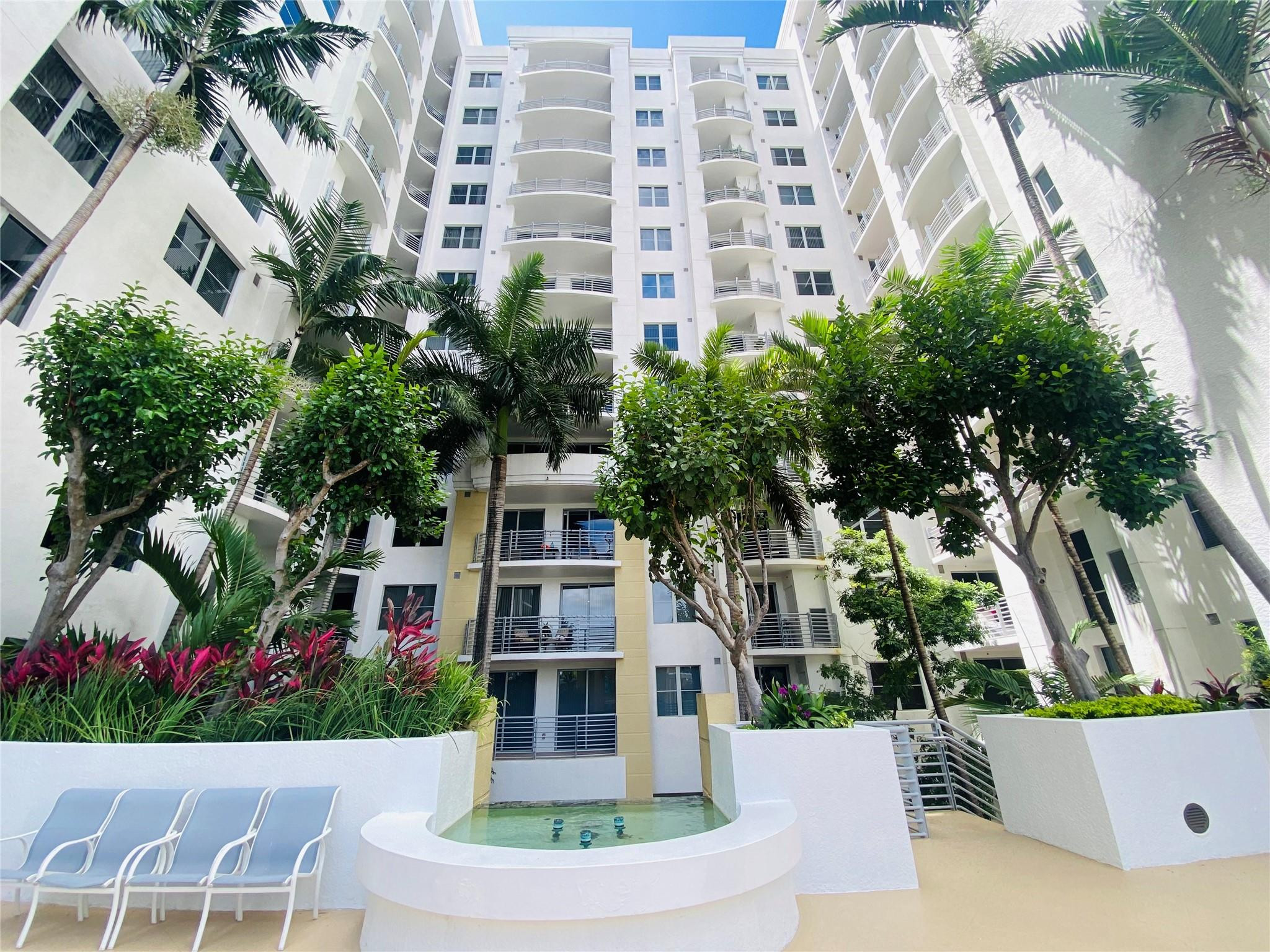 Calling all investors! Excellent opportunity to own an income-producing property already rented to great Tenants. Experience elevated urban living at Radius Condominium in the heart of Downtown Hollywood. This upgraded 2/2 residence features tile flooring throughout, soaring ceilings, a modern kitchen with granite countertops & s/s appliances & an in-unit W/D. Spacious bathrooms offer a Jacuzzi tub & separate shower. Recent upgrades include A/C (2025), W/H (2022),  & microwave (2026). Enjoy resort-style amenities including a rooftop pool, fitness center, spa/sauna, theater room, business center, 24-hr security, valet, & one assigned covered parking space. Prime location within walking distance to dining, shopping & supermarkets, just minutes from Hollywood Beach Broadwalk & the beach. HOA includes wi-fi, cable, water , one parking space and all amenities.