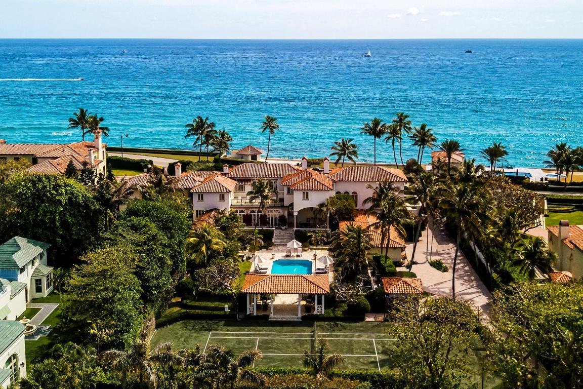 Spectacular Oceanfront Mizner compound with tennis court, sunrise and sunset swimming pools, and direct beachfront cabana. Gorgeous landmarked Estate with extensive and rich history features stunning architectural details and oversized fireplaces. Perfect for entertaining with sprawling grounds and large oceanfront dining room, library, and grand salon with wet bar. Expansive oceanfront Owner's Wing with sitting room, dual baths, study, and large open terrace. Highlights include 7+ bedrooms, 9 baths, 3 powder rooms, 3 car garage, and tennis pavilion. Fantastic Estate Section location with 180 feet+/- of ocean frontage.