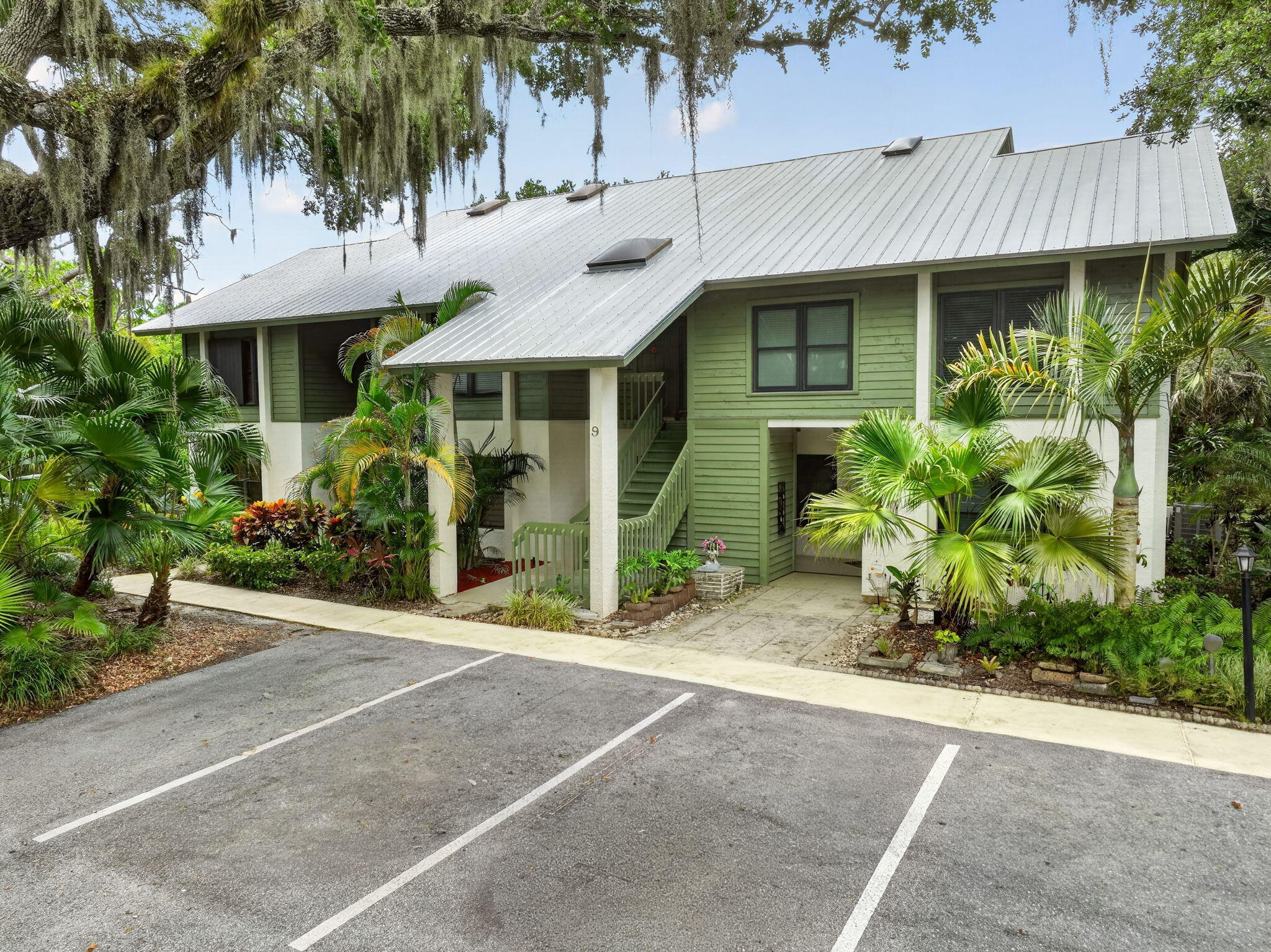 Completely renovated from top to bottom, this stunning first-floor 2-bedroom, 2-bath Condominium offers 1,125 square feet of move-in-ready living just minutes from beautiful beaches.  No detail was overlooked in this extensive renovation. Enjoy Brand-New Flooring throughout, a beautifully redesigned Kitchen with New Cabinetry, Quartz Countertops, and Fixtures, along with two Fully Remodeled Bathrooms featuring modern finishes. Additional upgrades include a Brand-New HVAC system, New Water Heater, New Retractable Ceiling Fans, New Washer and Dryer, updated electrical outlets and switches, contemporary LED lighting throughout, New Toilets, New Door Hinges, and Doorknobs. Nearly every surface and fixture has been thoughtfully updated, providing the feel of a brand-new home. Vacant Easy to See