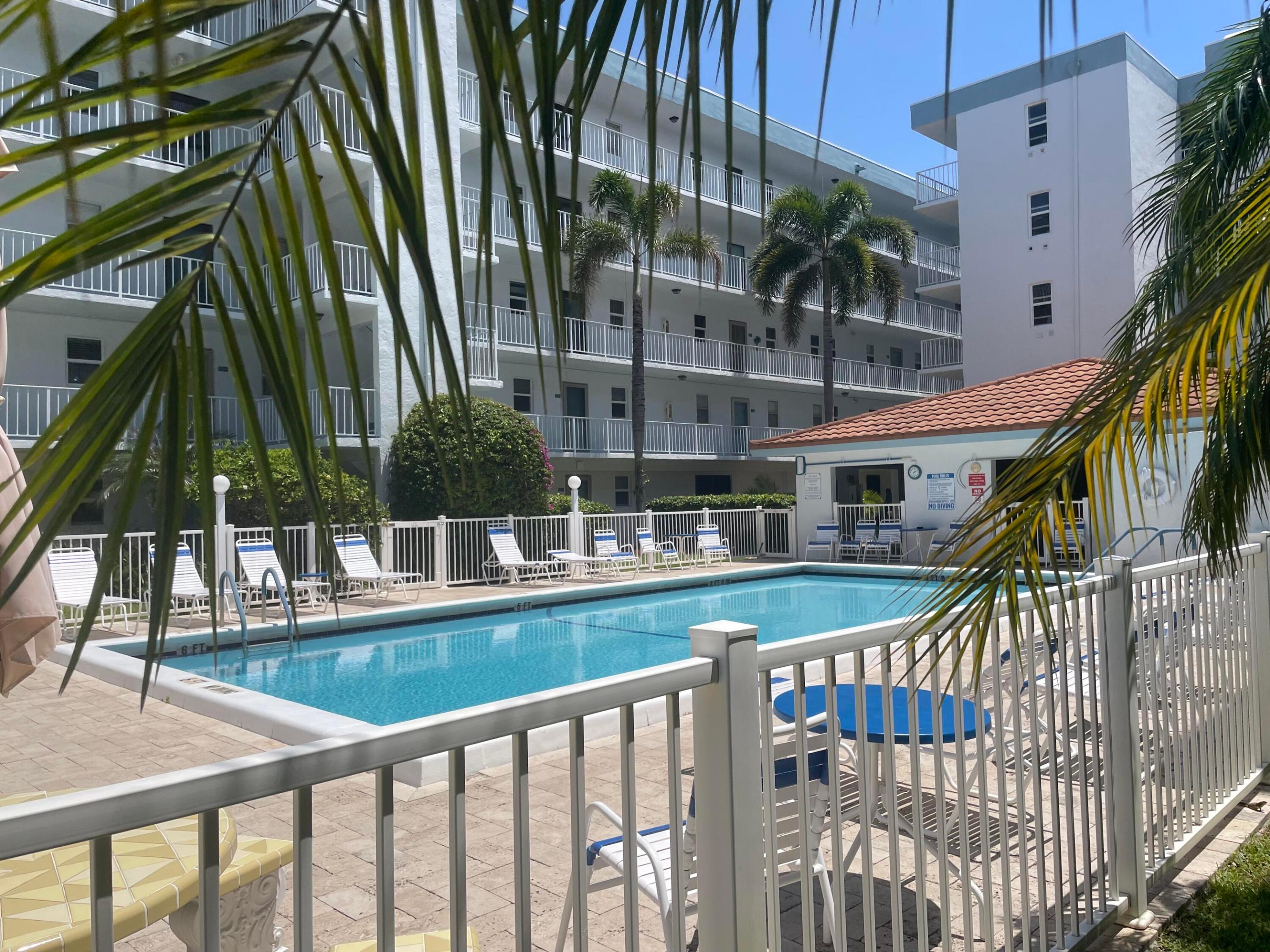 Exceptionally updated and located in the heart of the seaside town of Lauderdale by the Sea! This pristine 2bed/2bath condo has almost 1,200sf of living space plus a large balcony. The exquisite kitchen could be featured in a design magazine. The well thought out split bedroom floorplan includes plenty of closet space and 2 ensuite baths. The open plan living room/dining room area is luxuriously appointed.  There are impact windows throughout as well as impact sliding glass doors. Beautifully maintained Poinciana by the Sea boasts tropical landscaping, a heated pool, a cabana with bbq grills along with bocce and shuffle ball courts. The well managed Association has low fees which includes reserves. Beautiful beaches, snorkeling, shopping and the vibrant town are all just a stroll away. Exceptionally updated and located in the heart of the seaside town of Lauderdale by the Sea! NO PETS. Minimum credit score of 650.