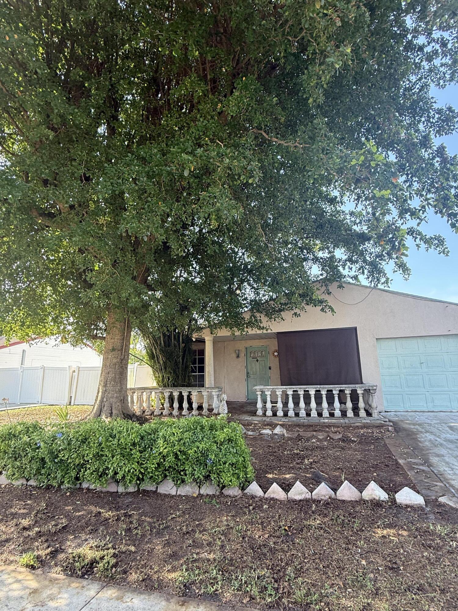 Calling all investors!  This 2-bedroom, 1.5 Bath, Flex room and single car garage home in Royal Palm Beach is ready for your next value-add project.  NO HOA restrictions gives full flexibility for renovation, rental, or resale.