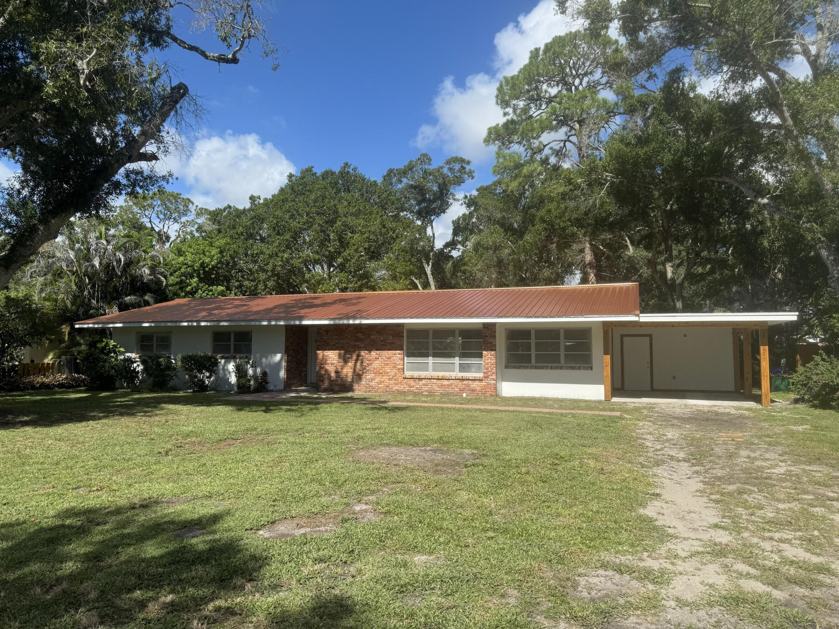 Located in historic Osceola Park, this 3-bedroom, 2-bath home with an office/flex room is less than one mile from Downtown Vero Beach's restaurants, shopping, galleries, and events. A park and playground are just one block away.  Major updates include all new PEX plumbing, new PVC drain lines, a new electrical panel with electrical upgrades, an open floor plan, fresh interior and exterior paint, new interior doors, renovated bathrooms with tile showers, and more.  The seller will continue renovations during the listing period, and the price may increase as work is completed. Buy now to maximize value and equity. Sold AS-IS with the right to inspect. Cash or renovation financing preferred.