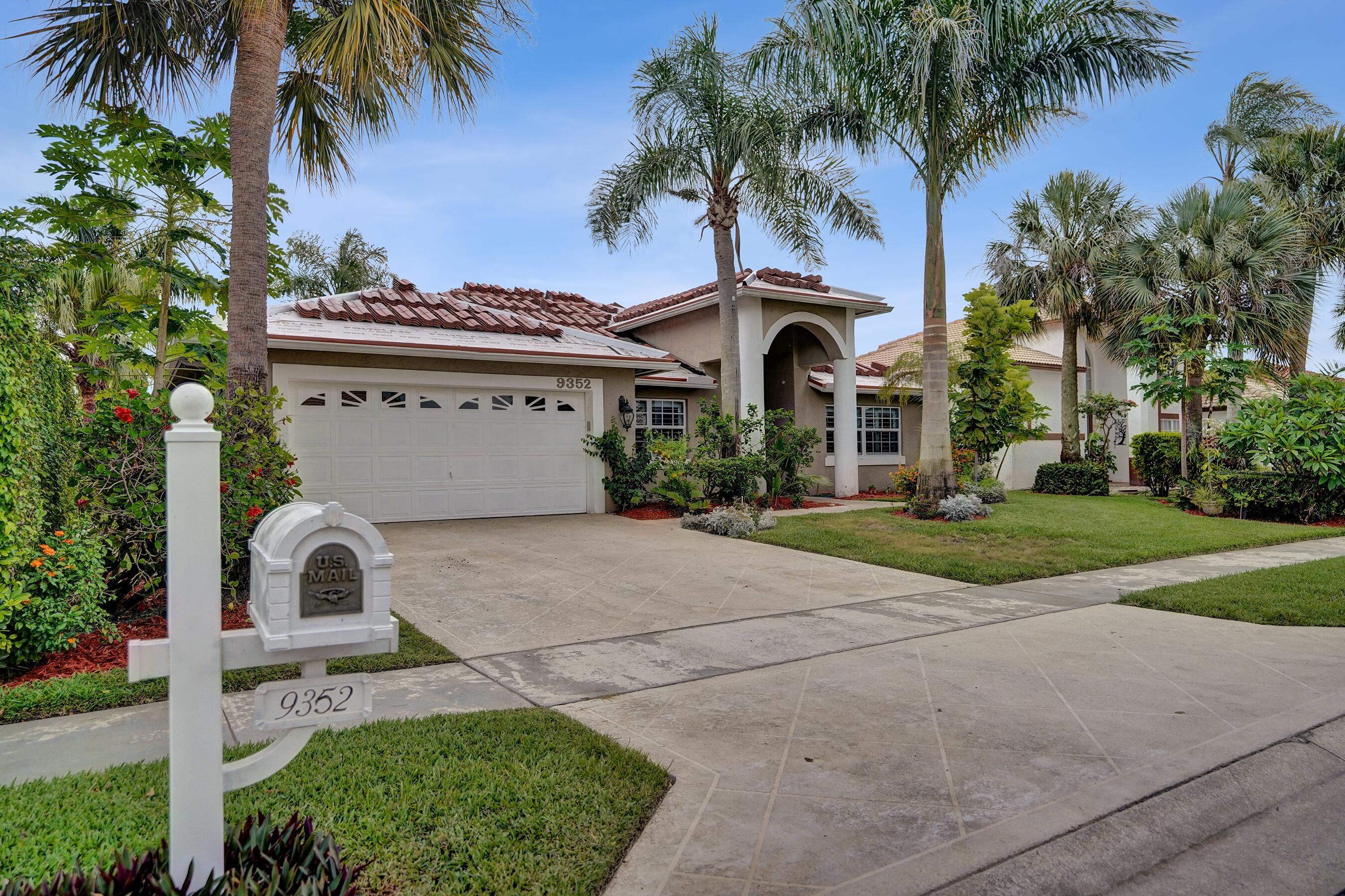 Your next address is here! Motivated Seller!  NEW TILE ROOF currently in progress. Welcome to Boynton Waters, a desirable gated community in Boynton Beach! This 3-bedroom, 3.5-bath pool home offers water views, a screened patio and private pool, and tropical landscaping with banana & coconut trees. Each bedroom features its own private full bath, while the spacious master suite includes a jacuzzi tub and separate shower. Enjoy a 2-car garage. LOW HOA fees. Conveniently located near shopping, dining, beaches, golf, and major highways. Qualified VA buyers may have the opportunity to assume the seller's low 3.65% VA loan. Don't miss this exceptional Florida waterfront lifestyle opportunity!