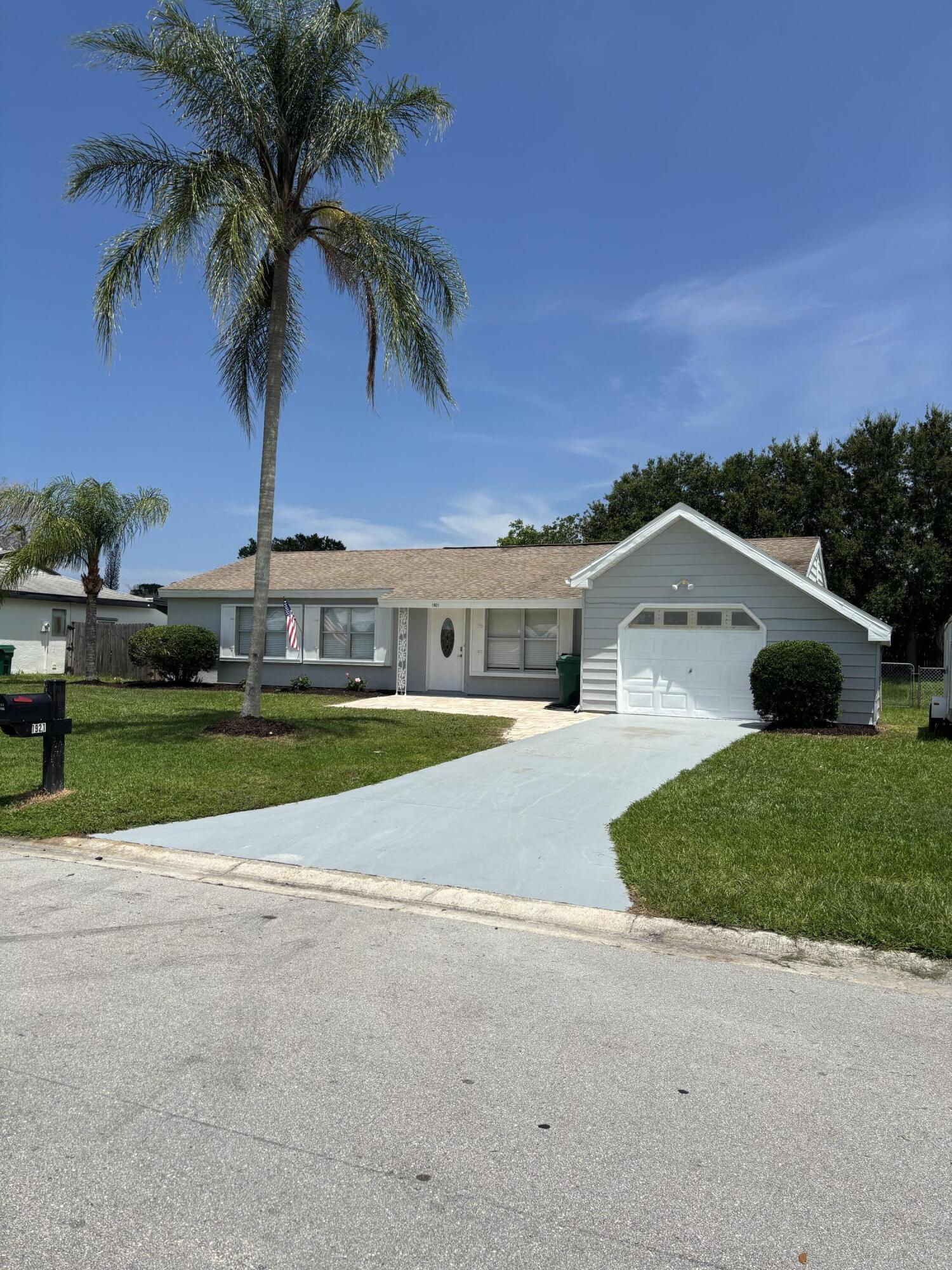 Spacious 4-bedroom, 2-bath rental offering over 2,500 square feet of living space in a wonderful Port St. Lucie location! Conveniently located just minutes from US-1 and only 15 minutes from the beach, this home features a fully fenced backyard with plenty of room to relax and enjoy the Florida lifestyle. Generous living spaces provide plenty of room for the whole family. No smoking permitted. Don't miss this opportunity to lease a beautiful home in one of Port St. Lucie's most desirable areas!