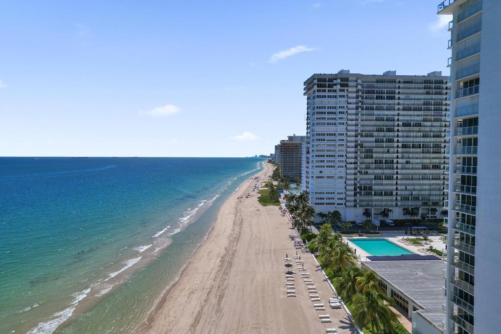 Look no further—this is the BEST VALUE on the sand! Discover over 2,000 sf of direct oceanfront living in this spacious corner residence with breathtaking, unobstructed ocean views the moment you walk through the door. With more than $70K invested in impact windows & doors, the major exterior improvements are already complete, leaving the interior as a blank canvas to create the coastal retreat you've always envisioned. This is a rare opportunity to own a premier oceanfront residence at an exceptional price & renovate to your exact taste. Plaza East offers an impressive collection of resort-style amenities, including beach lounges & umbrellas, heated pool, BBQ, gym & fully renovated lobby & clubroom. The building offers fully funded reserves, completed 40 & 50-year & SIRS.