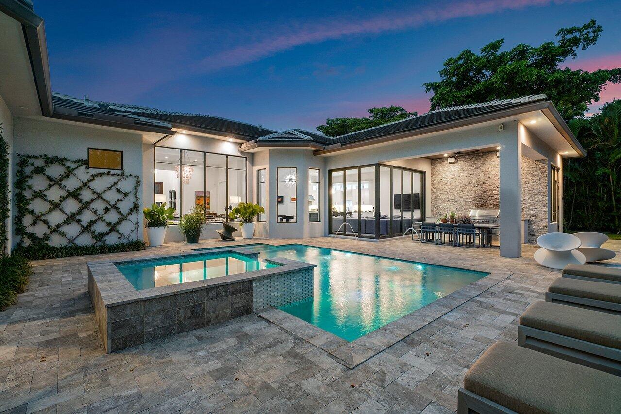 Immaculate and exquisitely appointed recent construction (2018) in St Andrews Country Club. A highly desirable southern facing modern one-story home, encompassing 4478 living sq ft (no steps), featuring 4 ensuite bedrooms, an office with a full bath, and a den/club room. The kitchen is open and bright, features Thermador appliances, has a large island perfect for entertaining and serious cooking, and a sizable pantry. The adjacent family room is open and airy, with walls of glass overlooking a private, perfectly manicured, secluded property with multiple entertaining areas, a summer kitchen, and a large pool and spa. The Den/Club room offers space for relaxation, a gym, or a place for kids or grandkids to call their own. The primary suite is spacious and beautiful and is well designed with two separate baths and two large closets. A three-car garage plus golf cart garage complete this modern, pristine, perfectly appointed home. 
St Andrews is a 24hr manned and gated mandatory membership country club community featuring 36 holes of championship golf, a full service 11,000 sq ft spa, multiple dining venues, a 20,000 sq ft tennis and fitness facility, 19 tennis courts and six pickleball courts, an aquatic center with three pools, playground & rec rooms and is recognized as an Elite Distinguished Club of the World, a Platinum Club of America, one of the Top Ten Healthiest Clubs in America, and received the 2019 North America Best Day Spa by World Spa Awards.