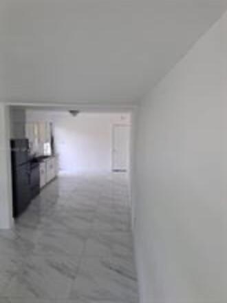Exceptional value-add investment opportunity in one of Dania Beach's most desirable residential pockets. Featuring an oversized 11,370 SF lot w/ rare dual access from both SW 51st St & SW 43rd Ter. This income-producing Triplex offers immediate cash flow w/ significant upside. 1 unit has been renovated, while 2 others present opportunity to increase rents w/ renovation. Property has an abundance of unused outdoor space presenting further value-add opportunity. Prime location creates built-in demand being just 5 min walk from Broward Maimonides Academy - one of the area's most established educational institutions. Minutes from beaches, FLL Airport, major highways, shopping, dining, & more. Strong location, strong demand & strong upside.