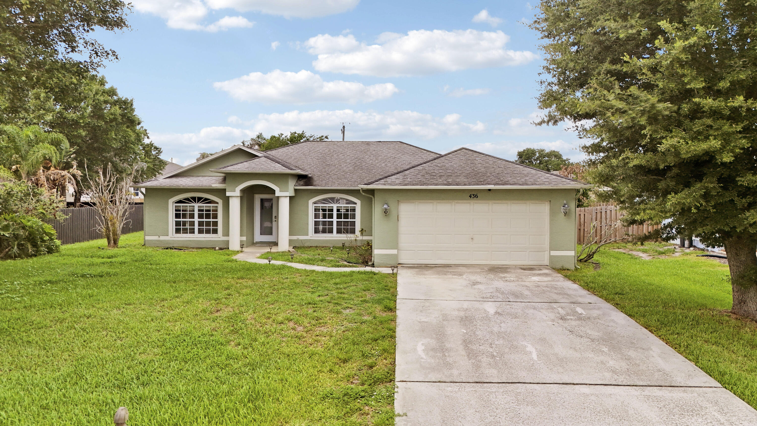 This 4BR/3BA/2CG POOL HOME is on a large lot and waiting for its new owners! Features include high ceilings, spacious open floor plan with tile & laminate flooring, roomy kitchen with white cabinets & SS appliances. Primary bedroom has walk-in closet and private ensuite with dual sinks, soaker tub & shower (also doubles as cabana bath). Three additional bedrooms share 2 guest baths. Access to screened patio from both living area & primary suite. Outdoors you will find a fully screened inground heated pool w/ spa & lots of space to lounge. The perfect spot to enjoy your morning coffee or evening refreshments! Conveniently located close to shopping, restaurants, area beaches & easy access to interstates. NO HOA!