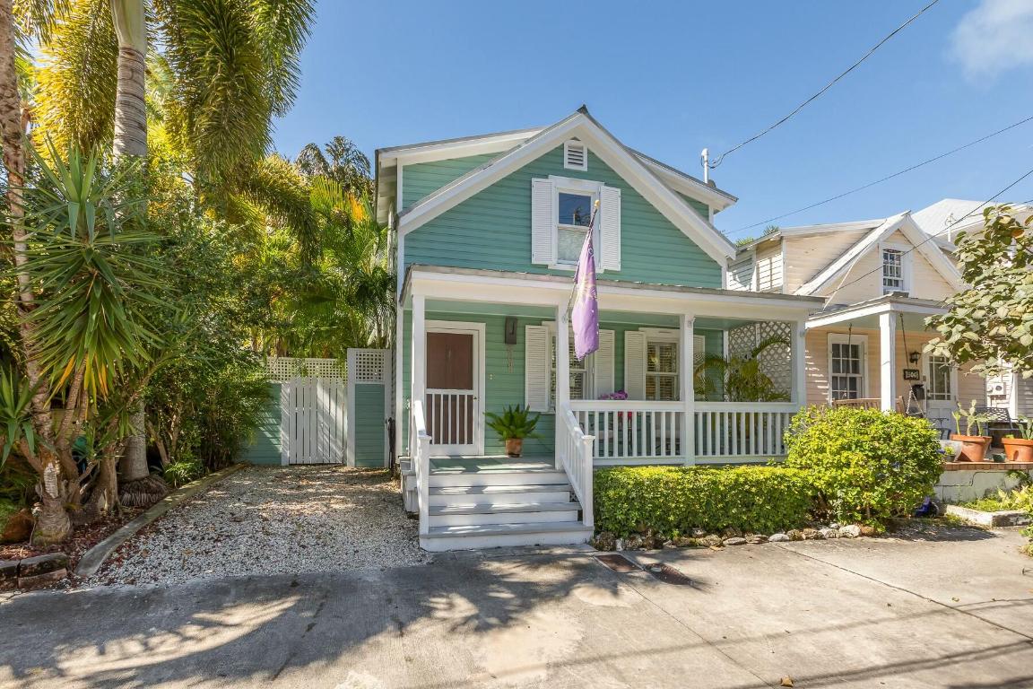 Traditional key West home impeccably maintained, boasts  three  bedrooms, three full baths with plenty of closets throughout the home. Large private lot with a heated pool featuring  a waterfall. Nice size cabana room that has  a/c and heat with ample closet space can be a fourth bedroom. This home has large rooms for entertaining, quaint front porch and off street parking. A true treasure.