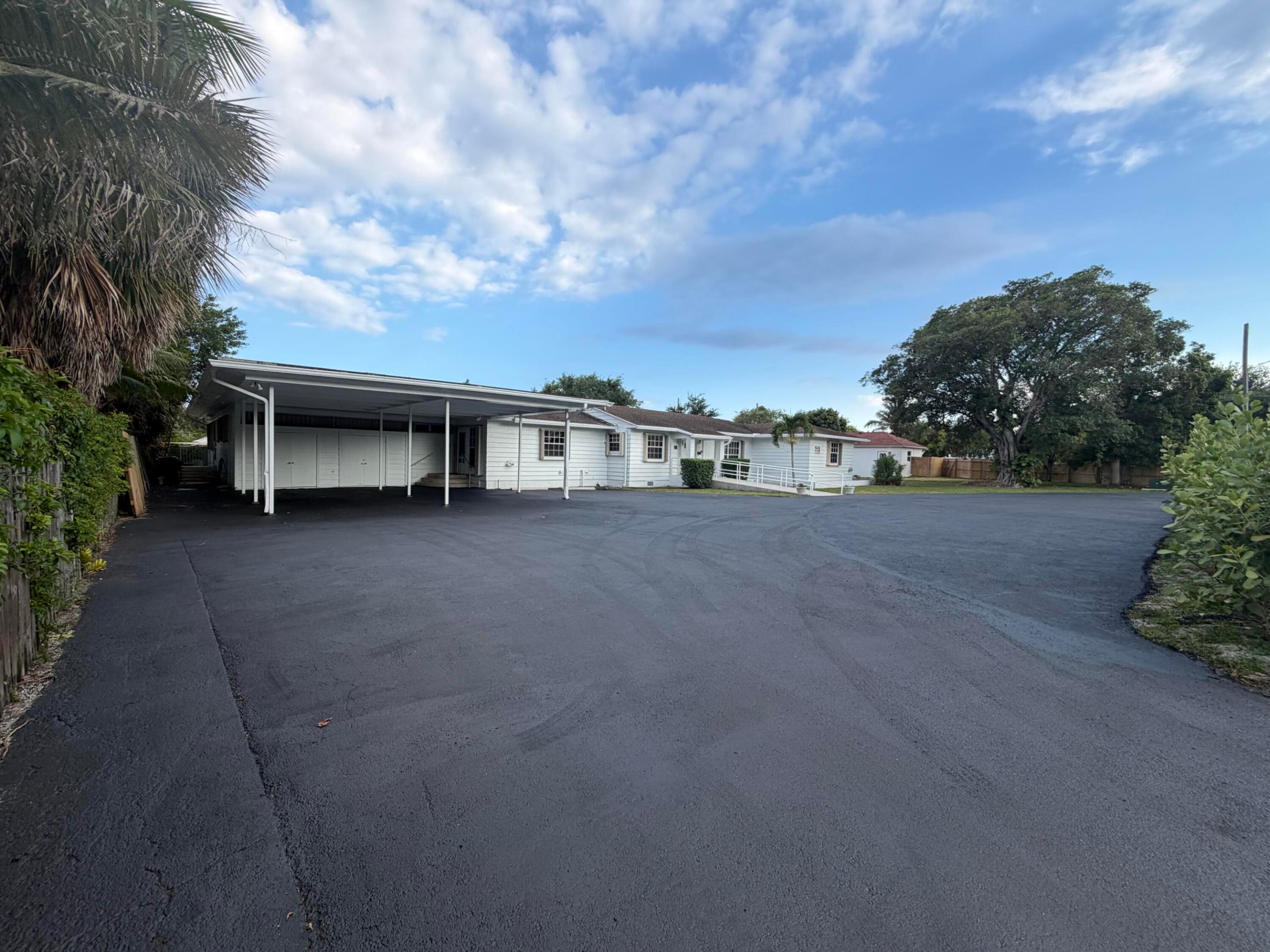 Exceptional 0.48-acre lot in Delray Beach. Zoned RO for residential, educational, medical, wellness, or office use. This large single-floor building is ready for immediate redesign or build-out. Just steps from East Atlantic Avenue.  Priced $800,000 below tax value.