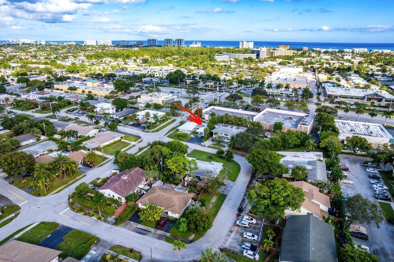 Fully Occupied Rare Investment Opportunity in Prime Deerfield Beach! Discover this one-of-a-kind quadplex situated on an oversized corner lot just minutes from world-class beaches, shopping, and dining. This property offers a versatile unit mix: one spacious 2-bedroom/1-bath, two 1-bedroom/1-bath units, and a 1-bedroom efficiency—ideal for maximizing rental income or house hacking. Two of the units feature private, newly fenced and professionally landscaped yards, perfect for outdoor living. Three units come fully furnished and turnkey ready. All units are equipped with brand new kitchen appliances, separate electric meters, and updated electric panels. On-site coin-operated laundry room offering extra income potential.