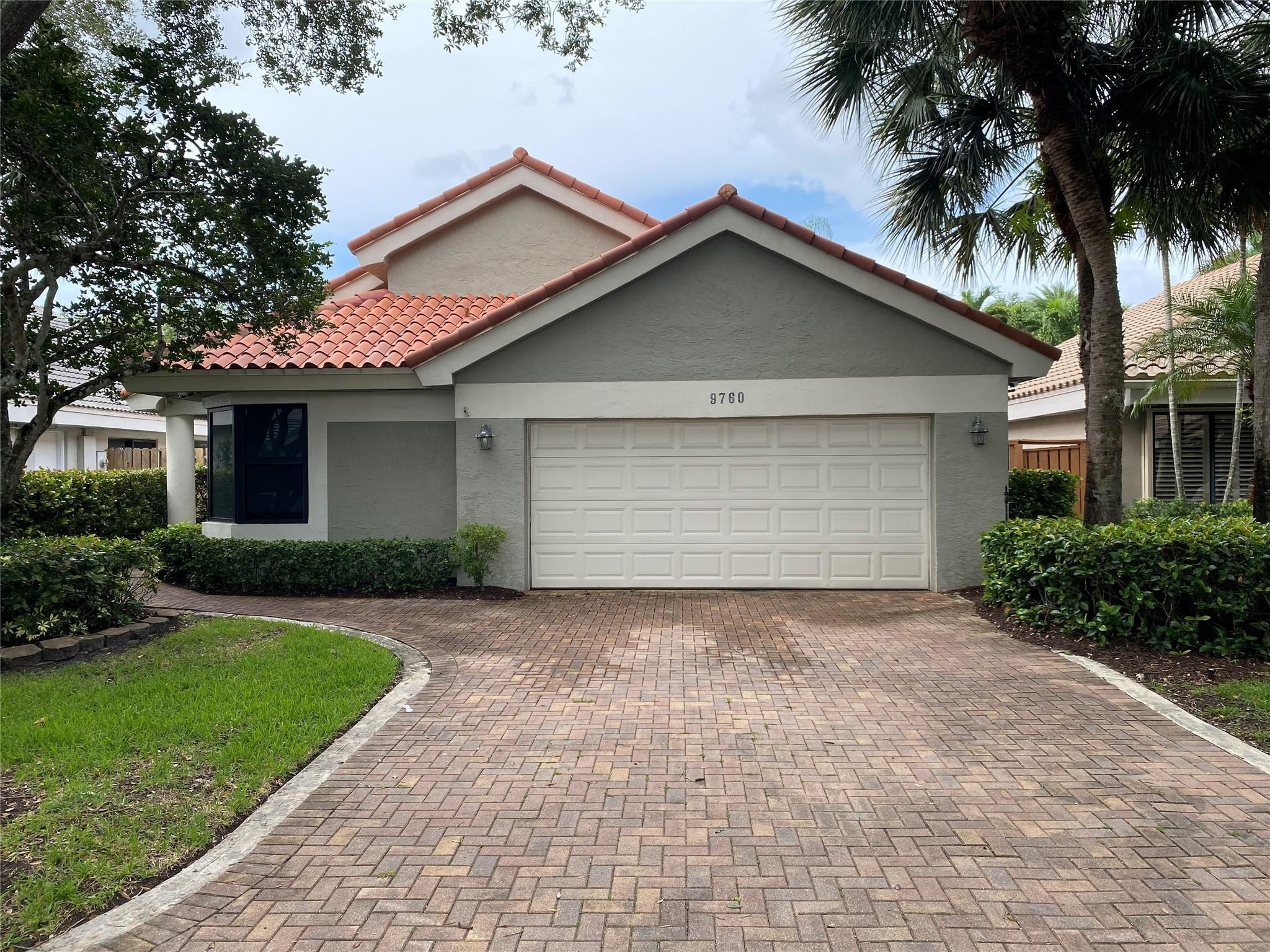 Highly desirable Plantation Cross Creek II neighborhood. Impact windows and  slider doors! Spacious floor plan with updated kitchen, baths and brand new central A/C in 2025. 3/2 with 2 car garage, screened  salt water pool/spa/patio area and green turf side yard. Living area and primary bedroom/bath open up to the outside pool/patio area. Very private! See pics for updated kitchen and bathrooms. Oversized primary bedroom with two large closets. Flexible floor plan! Salt water pool.  HOA approval required. Please review rules/regs before submitting an offer. Parking restrictions, etc. HOA fee includes front lawn service.