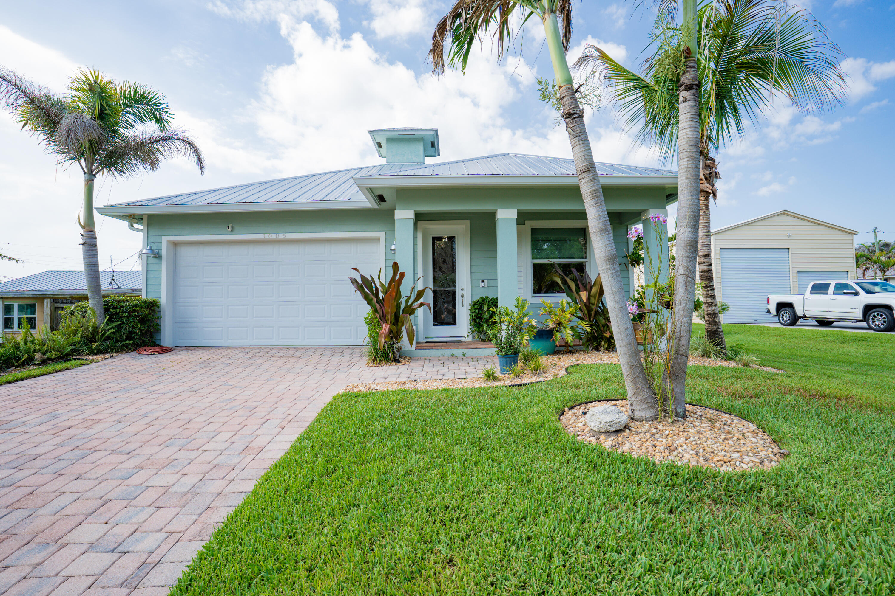 Welcome to this beautiful 2017-built Palm City home offering 4 bedrooms, 3 baths, & 2 car garage. The open floor plan features high ceilings, wood-look tile flooring through main living area, brand new carpet in all bedrooms & a stylish kitchen with granite countertops, marble backsplash, shaker cabinets with crown molding, & a walk-in pantry. All appliances, including the washer and dryer, convey. Additional highlights include NO HOA, hurricane-impact glass entry door, Ring camera system, central vacuum, tin roof, and a cobblestone paver driveway. Enjoy a large fenced backyard with plenty of room for kids and pets to play. Conveniently located within walking distance to restaurants & Publix, this home offers both comfort and convenience in a prime Palm City location.