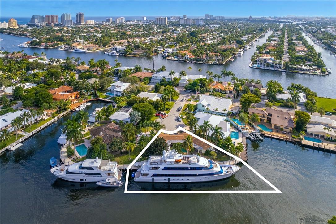 A unique opportunity offering MEGA yacht deep-water dockage, the home is nestled in the beautiful, gated & secured island community of Sunrise Key. Private & secluded courtyard & pool area, home offers a newer solid concrete dock & rare straight-line dockage w/ an estimated 10 foot draft. Don't miss this unique opportunity to renovate or develop your new dream home on this quiet cul-de-sac, with 175' of mega yacht dockage with 480 volt 3 phase power. Conveniently located just minutes to the Intracoastal with no fixed bridges. Enjoy the close proximity to Las Olas shops, dining, entertainment, Beach and the Fort Lauderdale Intl. Airport. This property offers both location and lifestyle!