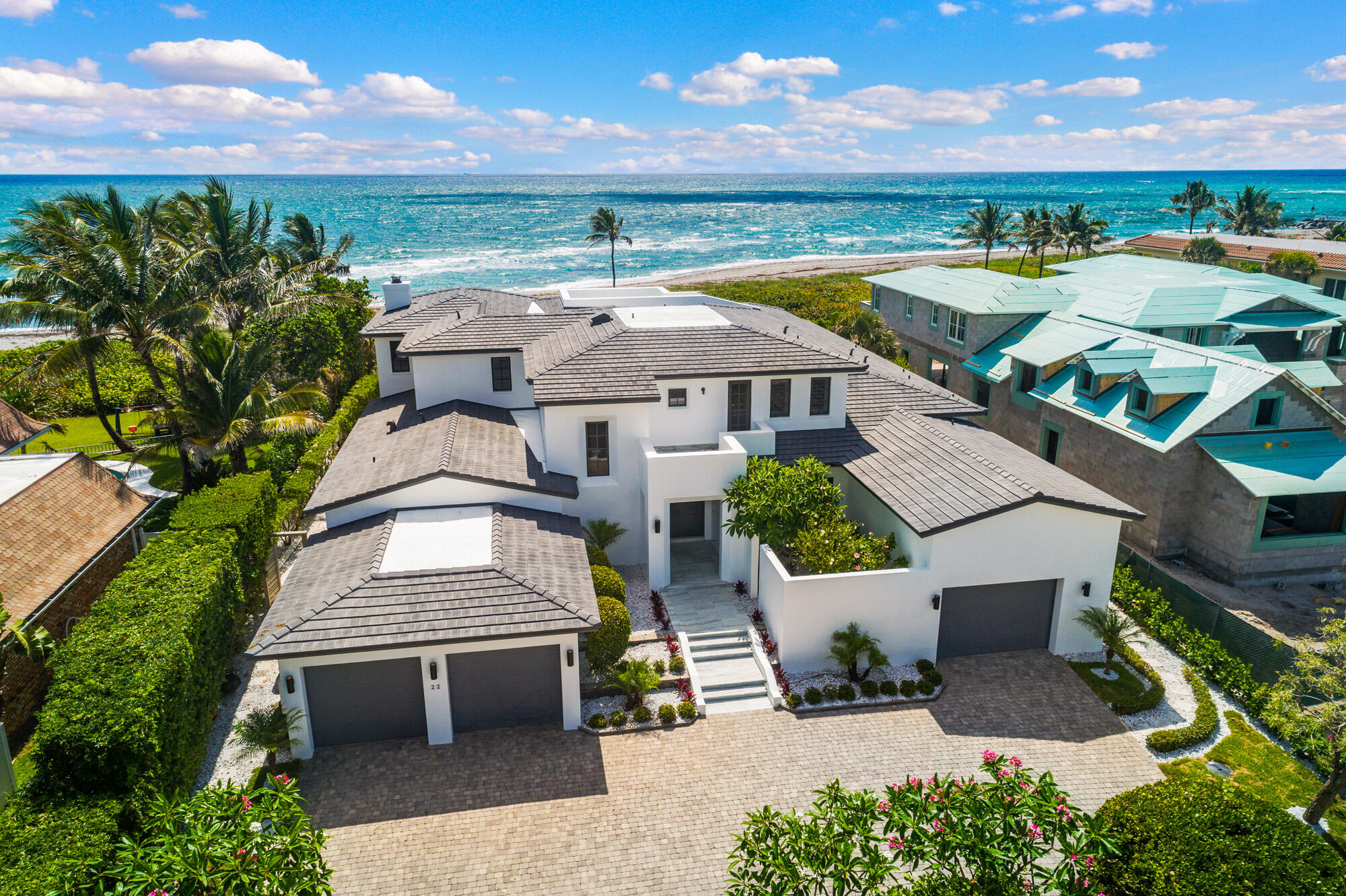 Unobstructed panoramic views of the turquoise Atlantic Ocean from this 8,600 total sf home with 5 bedrooms and 5.5 bathrooms. Constructed in 2011 and recently updated, the home is situated on one of the highest elevated lots on the ocean in south Florida! Panoramic ocean views and great views of the Jupiter Inlet everywhere from the expansive downstairs master suite, oversized kitchen, all living areas and guest bedrooms. The recently updated kitchen opens to the living area spacious covered patio. All new beautiful outdoor stone pavers and renovated pool area that overlooks the turquoise blue waters of the Atlantic! Other features include newly updated landscaping, impact windows and doors, elevator, large balcony overlooking the ocean, rooftop terrace looking down on the ocean and back at the historic Jupiter Lighthouse, 3 car garage, infinity edge pool, concrete block and poured concrete and steel construction, and a very attractive home inside and out! 
Located in Jupiter Inlet Colony on the southern tip of Jupiter Island, this premier oceanfront location is close to everything, but secure in one of the safest towns in America. Surrounded by the Atlantic Ocean, Intracoastal Waterway and The Jupiter Inlet, Jupiter Inlet Colony is Jupiter Island's best kept secret. It offers its residents a spectacular lifestyle with amenities such as, secluded & pristine beaches, great fishing & snorkeling, optional Beach Club membership, private marina & yacht club, & proximity to world class shopping.