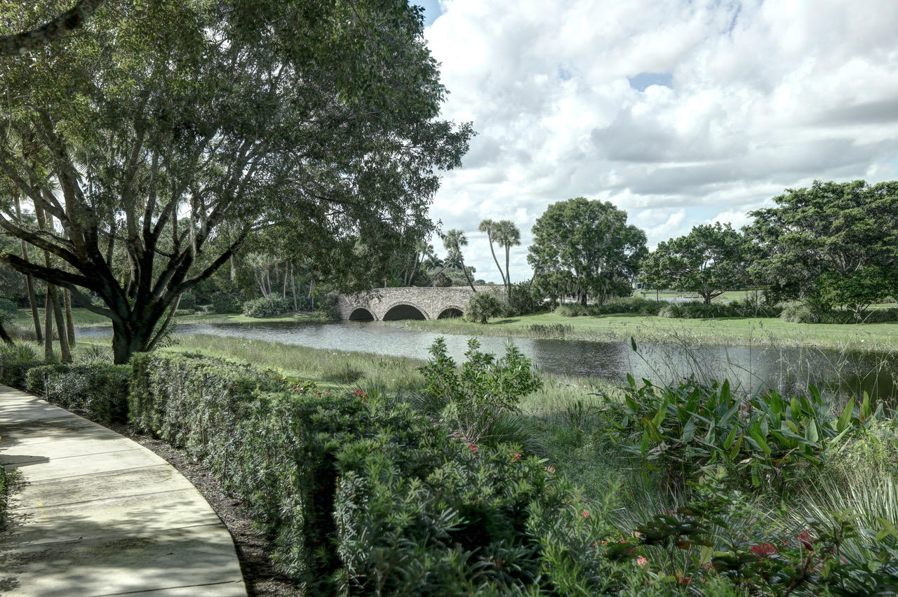 The Sundara Estate is an impeccable new contemporary masterpiece recognized as one of the finest properties in the United States. This custom mansion offers world-class design and lifestyle of unrivaled amenities, privacy and security.  It is situated behind private gates of Stone Creek Ranch, one of the most exclusive and sought-after communities in Palm Beach County.
The grand arrival of the Sundara Estate showcases the world' s finest materials, craftsmanship and architectural splendor never seen before. Entering the dramatic two-story grand foyer this 26,000 SF custom residence immediately captivates the senses with shimmering natural light radiating from the 30ft floor-to-ceiling great room wall of windows. Haute couture and glamour take center stage throughout the Estate. It is the view of the Four Seasons Bali inspired outdoor oasis that evokes tranquility. This magical Zen experience embodies serenity and peacefulness through nature, fire and water. From the far reaches of Indonesia, Buddha statues gracefully adorn the landscape and were thoughtfully placed by a feng shui master. This sanctuary style retreat features a 170,000 gallon salt water oasis with cascading water features, multi-level poolside cabana and custom ambiance lighting synchronized with the latest audio technology. 

The Sundara estate boasts 7 gracious bedroom suites, 10 luxuriously appointed full bathrooms, 2 elegant powder rooms, state-of-the-art gym with sauna and massage room and a car collector's dream garage.

The custom state-of-the-art entertainment area sprawls over 4,000SF including a state of the art theatre, game room clad in sports memorabilia, swanky hotel inspired bar, and opens up to a transitional indoor-outdoor lounge area fully equipped with summer kitchen and wood-burning oven for entertaining guests. 

As a true entertainment residence, included is a separate industrial catering kitchen with top-of-the-line appliances and butler's pantry which leads into a magnificently dining room decorated with over $100,000 of imported Terzani lighting fixtures.  

A private office features a 30ft high Carrera fireplace and a hidden passage way to a luxurious cigar lounge complete with a state-of-the-art air purification system. 

The indulgent master wing is designed to take everyone's breath away! The Chanel inspired boutique closet and sitting area glamorously accommodate the finest haute couture collections. With double height open shelving, jewelry and accessories are showcased effortlessly. The master suite includes mother of pearl inlay flooring, his & her bathrooms with private terrace, as well as a hidden safe room. Complementing the main residence, is a fully equipped guest house with private entrance. 

The Sundara is truly a sight to behold and will appeal to the most discerning of tastes.