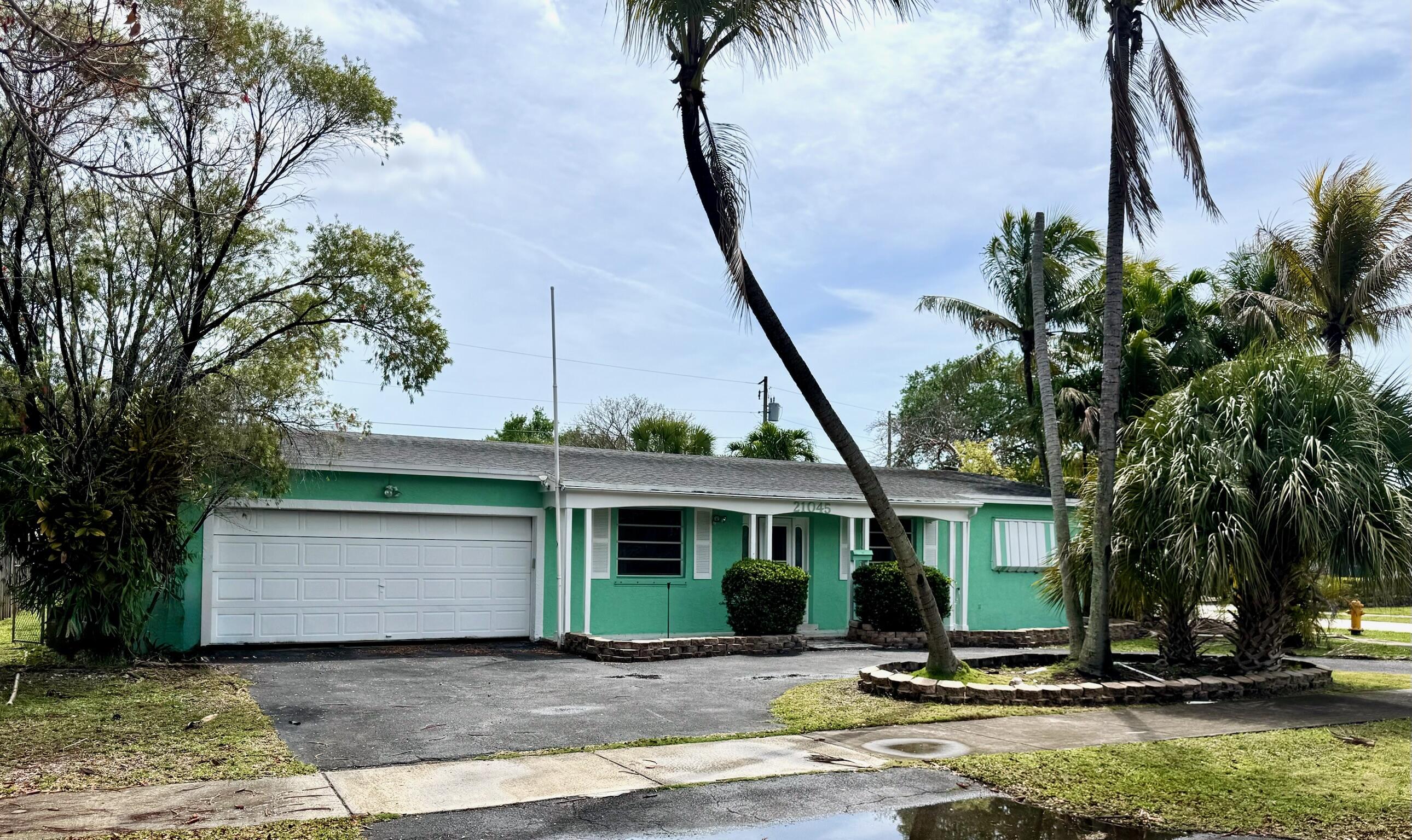 Beautiful 4/2 Cutler Bay home on a spacious corner lot featuring a sparkling pool, expansive screened lanai, and dedicated RV pad. Bright, open concept living area. Kitchen boasts solid wood cabinets and breakfast bar that can extend when sliders are open. The desirable split floor plan provides added privacy with the primary suite separate from the secondary bedrooms. Primary bedroom offers large customized walk in closet. The outdoor space is ideal for gatherings and entertaining with its space. Cutler Bay offers a suburban calm, friendly neighborhood with easy access to parks and Biscayne Bay, diverse dining, and a relaxed South Miami vibe with steady growth.