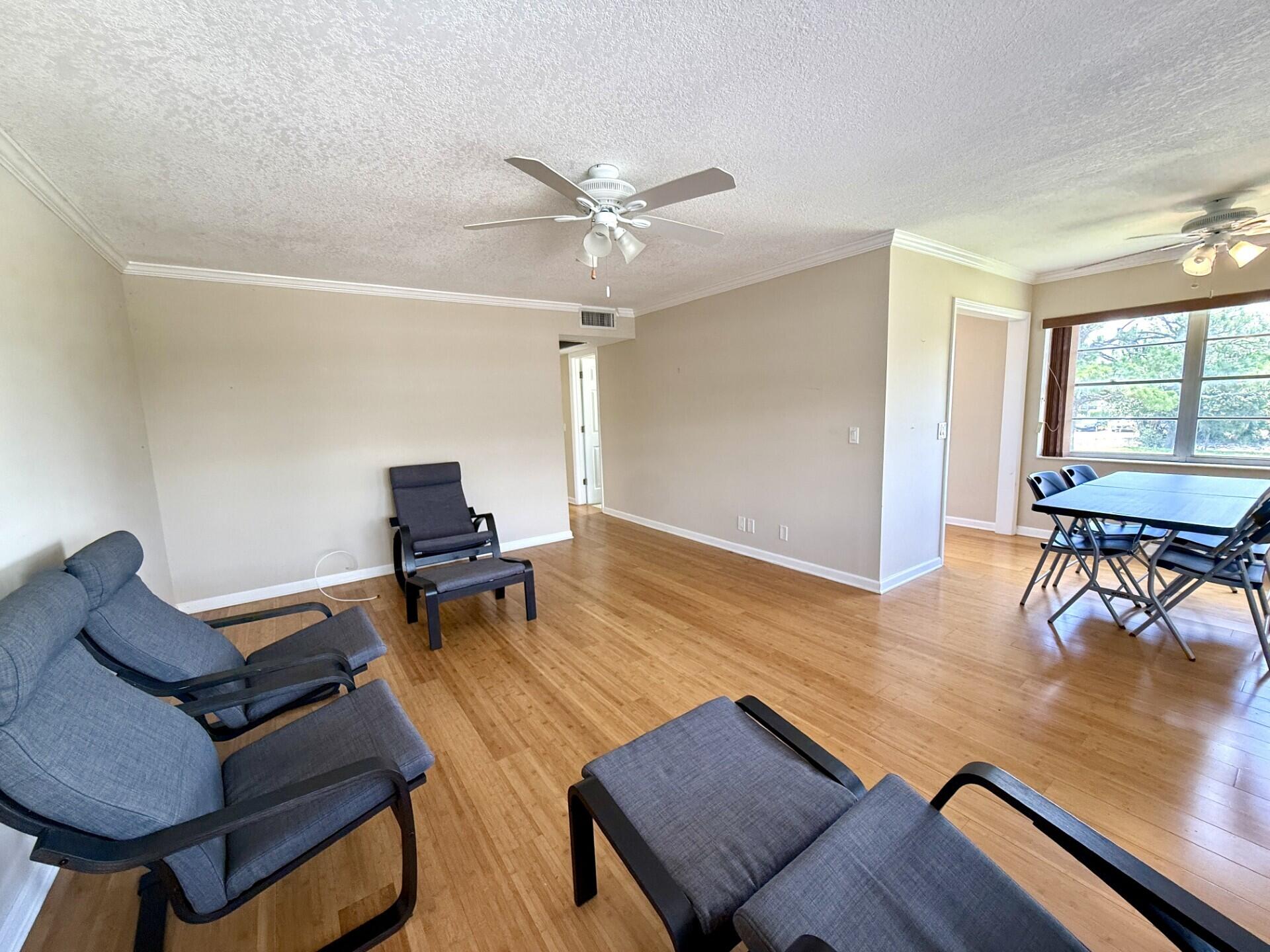 Beautifully Updated Condo for rent in 55+ Century Village! Delightful light & bright 2 Bedroom & 1.5 Bath unit with central AC & tastefully furnished. Updated kitchen & bathrooms. The Screened Lanai Is A Lovely Spot to Take In The Fresh Air and Garden Views. Century Village is a 55+ community with so much to offer...shows, movies, clubs, pools, security, and transportation service. The Clubhouse features a theater, indoor pool, card room, community/party room, billiard room, shuffleboard, tennis, pickleball, bocce, and two outdoor pools. Numerous heated outdoor pools throughout the community. Separate fitness center with gym. Two guarded gates and 24-hour security patrol. Schedule Showings Online. 55+ Community Occupants Must Be 55+. Offers: For Owner Review Submit a CTL With RentSpree or Other Credit/Background Check, Proof of Income Documents, and Proof of Age -- OCCUPANTS MUST BE 55+. Tenant Approval By Association Required and May Take 30 Days From Time A Complete & Accurate Application Is Submitted to the Association. Required To Move In: First, Last, and Security. Association Application Fee is $150. Occupants Must Be 55+