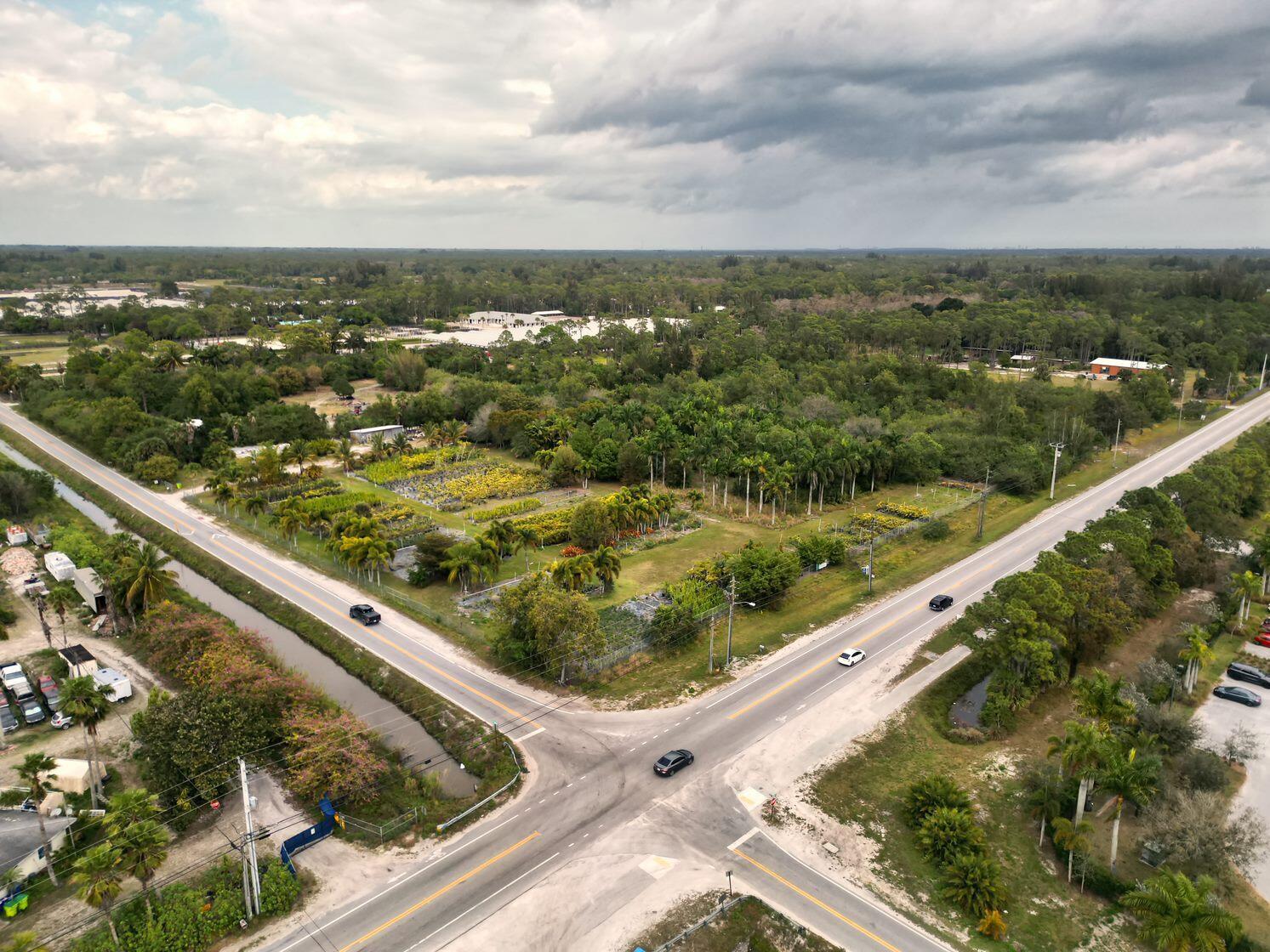 10 cleared acres on Prime corner location of Okeechobee Blvd & D Rd. 

Centrally located between West Palm Beach, Wellington and Westlake in Palm Beach County. 

One of the last few large parcels available on Okeechobee Blvd. 

D Rd leads directly to Southern Blvd. 

Irrigation System in place for Plant Nursery. 

Ag/Res zoning allows residences, caretakers qtrs., barns, wholesale nurseries with landscaping operations to serve customers, covered arenas, RV's and more! 

Agritourism events permitted on Bona Fide Ag classified property.

Nursery Stock does not convey. 

Minutes to turnpike, Airport, fine dining, equestrian events and beaches. 

Adjacent property available for a total of aprx 20 acres.

All measurements & outlines are approximate.

Shown by appointment.