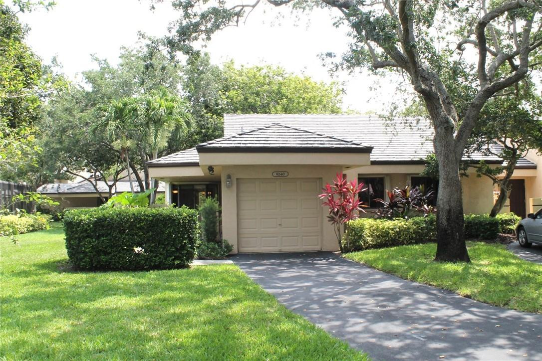 NESTLED IN THE HEART OF CHELSEA ONE ON A QUIET CUL DE SAC, THIS 3 BEDROOM, 2 BATH VILLA HAS A ONE CAR GARAGE WITH HURRICANCE RATED DOOR, NEW ROOF IN 2018, UPDATED FLOORS AND MASTER BATH AND KITCHEN WITH WOOD CABINETS AND GRANITE COUNTERS.   IT IS A CORNER UNIT WITH SCREENED PORCH AND OFFERS A PRIVATE FEEL.  HURRICANE PROTECTION IS AFFORED BY A COMBINATION OF ACCORDIAN SHUTTERS AND IMPACT WINDOWS. THE LIVING ROOM WITH VAULTED CEILINGS IS A WELCOMING SPACE FOR ENTERTAINING ALONG WITH LARGE SCREENED IN PORCH.