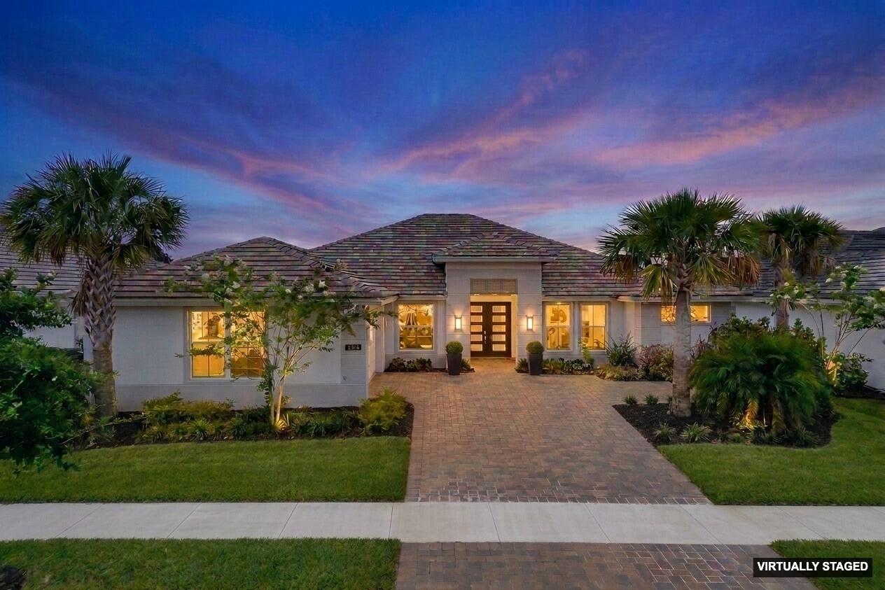 Another opportunity to own one of Belterra's most sought- after floor plan. Thoughtful improvements have already been made, allowing the next owner to enjoy the benefits without the additional costs, delays, and decisions. Significant investments have been made in custom electric Hunter Douglas window treatments, a fully fenced yard, private screened-in pool, and thoughtful improvements throughout. The next owner gets to enjoy the result without the additional costs, delays, and decisions that often come after purchasing a home. This is the highly sought-after Willow Signature model, a discontinued single-story floorplan offering 5 bedrooms, 3-1/2 baths, a three-car garage, private pool, and the kind of flexible living space buyers are struggling to find in today's market.  Why wait months for new construction, spend thousands on upgrades after closing, and settle for what's currently available when this home already offers the features buyers are searching for most? Positioned on an oversized homesite with no backyard neighbors, this residence was designed for both privacy and entertaining. Soaring ceilings, abundant natural light, wood-look tile flooring, custom finishes, and a seamless indoor-outdoor lifestyle create a home that feels every bit as impressive as it is functional. The chef's kitchen features quartz countertops, gas cooking, wine storage, extensive cabinetry, and abundant prep space. The luxurious owner's suite offers a true retreat, while impact glass, custom storage solutions, upgraded landscaping, and a fenced backyard complete a home where nearly every major improvement has already been made. For the buyer who thought they missed their chance, here's another one.