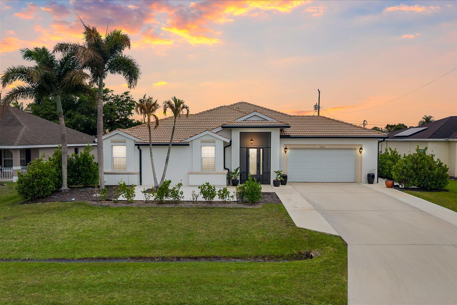 NO HOA! Stunning 4-bedroom, 2.5 bath CBS heated pool home with a 2-car garage located in the heart of Port St. Lucie. This spacious home offers a bright and airy floor plan with soaring custom ceilings, designer touches, and large windows that bring in plenty of natural light throughout. The kitchen features a gas stove, a rare feature in Port St. Lucie and a huge plus for those who love to cook. Recent updates include a brand new AC system and tankless gas water heater. Step outside to your private backyard oasis complete with a fully fenced yard, sparkling pool, extended pool deck, and covered patio perfect for entertaining or relaxing year-round. Conveniently situated near Tradition and between I-95 and the Florida Turnpike for easy commuting and quick access to South FL!