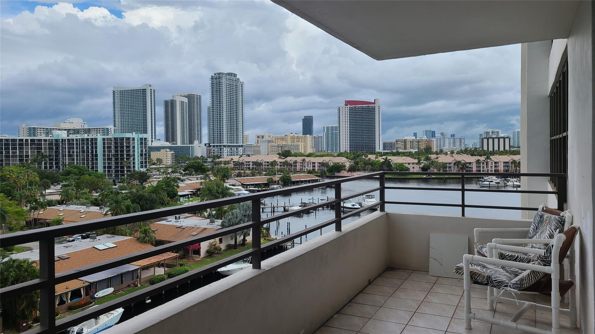 Completely remodeled! Newer custom kitchen; tons of storage, stainless appliances, new lighting, and granite counters. Partially furnished/unfurnished.  Sliding doors open to a rare large private balcony overlooking the bay area, intracoastal and ocean views. Beautiful views from the living room and bedrooms. Both bathrooms are completely remodeled.  Huge master with two closets. Large walk in storage closet in the entry. Valet, 2 washer/dryers each floor. 700 Credit score min. Spectacular amenities!