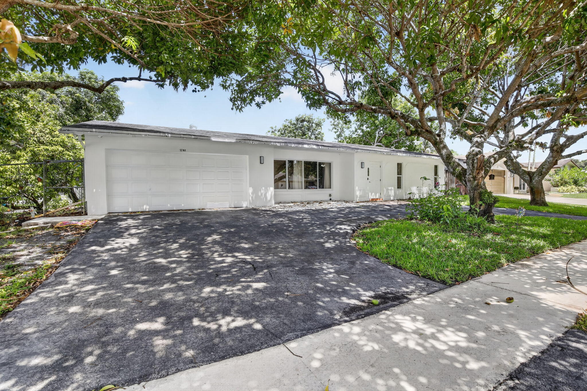 Welcome to your dream oasis in the heart of Pembroke Pines, featuring no HOA restrictions! This stunning 4-bedroom, 2-bathroom single-family home offers ultimate peace of mind with impact windows and a brand-new roof to be installed prior to closing. Step inside to discover a bright, spacious layout complete with a whole-house water filtration system and a modern kitchen boasting a brand-new refrigerator. The living space flows seamlessly to your private backyard paradise, where a sparkling pool and a large screened patio await—perfect for outdoor dining and entertaining. Offering the ideal blend of comfort, style, and freedom, this property is ready to welcome its next owners.