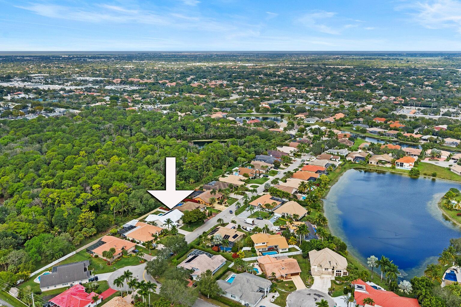 Exceptional 5BR, 4 FULL BA home in gated Carriage Pointe Estates featuring a highly desirable triple-split floor plan ideal for privacy and multi-generational living. Soaring ceilings and abundant natural light enhance spacious open living areas. Luxurious primary suite offers marble spa bath with rare wet-room design. Expansive living spaces flow to a private heated pool and fully fenced backyard backing a protected sanctuary with no rear neighbors for unmatched privacy. Dual A/C systems, generously sized secondary bedrooms, and excellent curb appeal. Enjoy 24-hr guard-gated security with top-rated schools, shopping, dining, and major highways nearby. A true South Florida retreat combining luxury, space, and functionality.