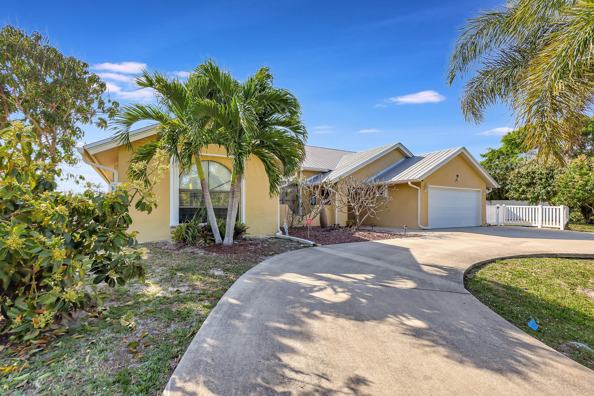 Live the island lifestyle in this beautifully maintained 3BR/2.5BA waterfront home in the gated Queens Cove community. Features include a private pool, boat lift, spacious open floor plan, and easy access to the Intracoastal Waterway and nearby beaches. Coastal living at its finest!