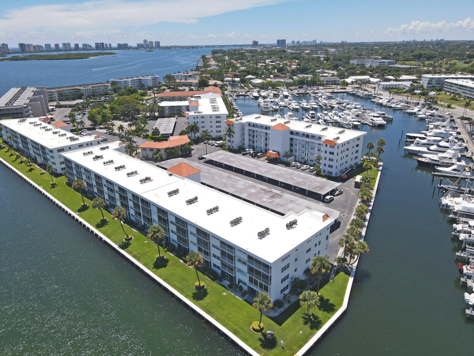 Spacious and functional fourth floor unit condo with a stunning waterfront view of the Intracoastal Waterway. With 2 bedrooms, 2 bathrooms and 1,010 Sq Ft of living space, this split floor plan unit is full of potential. The main bedroom features a walk-in closet and a nice bathroom with a walk-in shower. The unit also features a large screened balcony with amazing water views. Residents of Ports O Call 55+ community have access to a variety of great amenities such as a clubhouse, common laundry facility, community pool and more. Additionally, residents have the opportunity to join the waitlist for the marinas boat slip rental. With a great central location in North Palm Beach, local amenities such as shopping, dining, recreation and major highways have never been easier to access.