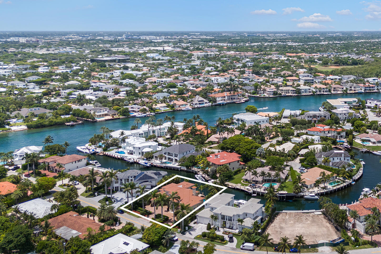 A Yachtsman's Paradise! Experience the epitome of waterfront luxury with this highly coveted, meticulously maintained 6-bedroom, 7-bath traditional estate. Designed by renowned architect Randall E. Stofft, the residence is hurricane-protected with original impact glass throughout. Offering 122 +/- feet of deep-water frontage, this rare property is just minutes from Lake Boca, The Boca Raton, and The Boca Inlet. Set on a seldom-available premium lot in a boater's dream location, this estate presents an extraordinary opportunity—whether you envision a thoughtful renovation to make it your own or a 2025 new-build spectacular masterpiece. A Yachtsman's Paradise! Experience the epitome of waterfront luxury with this highly coveted, meticulously maintained 6-bedroom, 7-bath traditional estate. Designed by renowned architect Randall E. Stofft, the residence is hurricane-protected with original impact glass throughout. Offering 122 +/- feet of deep-water frontage, this rare property is just minutes from Lake Boca, The Boca Raton, and The Boca Inlet. Set on a seldom-available premium lot in a boater's dream location, this estate presents an extraordinary opportunitywhether you envision a thoughtful renovation to make it your own or a 2025 new-build spectacular masterpiece.

Sun and Surf - A Yachting Lifestyle Redefined
This premier waterfront setting offers direct access to the Intracoastal with no fixed bridges, placing the Atlantic Ocean just minutes away via the nearby Boca Inlet. Perfect for those who embrace the true yachting lifestyle, the property enjoys an ideal position between the Intracoastal and the Atlantic. Also, directly across from the quintessential Red Reef Parkhome to a scenic Par-3 golf courseand within walking distance to the beach, this location delivers an unparalleled blend of coastal serenity and refined luxury.

DISCLAIMER: The information herein is believed to accurate but not guaranteed and may be subject to errors, omissions and changes without notice. All measurements, dimensions, room sizes and lot sizes are approximate. All such information should be independently verified by any prospective purchaser. Parties should perform their own due diligence to verify such information prior to a sale. Listing company expressly disclaims any warranty or representation regarding such information.