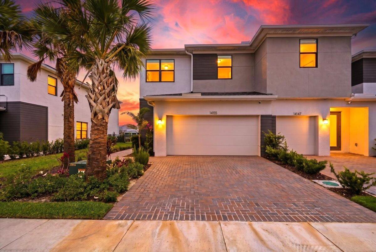This beautiful Model Home at Cadence at Tradition offers 1,917 sq. ft. of thoughtfully designed living space featuring 3 bedrooms, 2.5 bathrooms, a loft, and a 2-car garage. The open-concept layout includes a spacious great room and kitchen filled with natural light from numerous windows throughout the home. The kitchen offers extended cabinetry and additional storage space off the garage. Upstairs features a versatile loft ideal for a media room, office, or lounge area. The private owner's suite includes a triple window, oversized walk-in closet, and spacious bath. Two additional bedrooms and a full bath provide flexibility for guest, or workspace needs. Conveniently located in the desirable Cadence community, offering modern living and functional design.