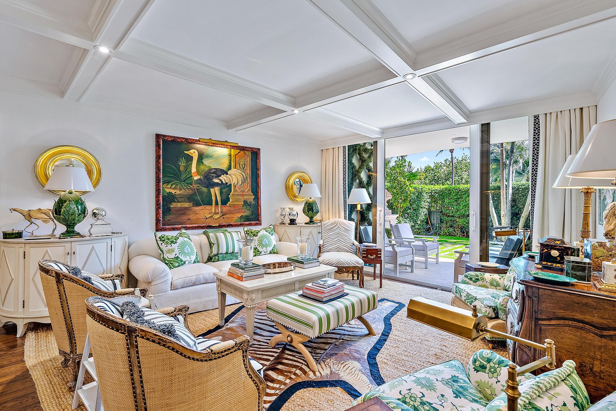 A rare 3 bedroom condo in a boutique building across from the ocean, One Royal Palm. AD designer decorated & fully renovated with a sublime private garden space with grass & patio to enjoy the cool ocean breeze. Luxury amenities include solid hardwood floors, intricate millwork, new kitchen & baths, bar area, & laundry in the residence. The primary suite is a dream with glass doors to the garden, a soaking tub, separate shower, double vanities & a spacious closet. The kitchen includes Calcutta marble, Wolf & SubZero appliances. Full-service building amenities include a door person, garage parking, storage, pool, gym, on-site building manager, full-time maintenance staff, car washing service, & an 8,000 SF common terrace. Minutes to iconic Worth Avenue, fine dining, beaches, & the airport.