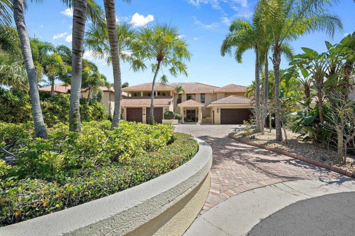 REDUCED SUBSTANTIALLY BELOW APPRAISED VALUE!   Experience unparalleled views from this exceptional high-elevation residence, featuring multiple balconies and expansive outdoor entertainment areas. This property offers everything you desire, including 100 feet of deep-water frontage, no fixed bridges, and a no-wake zone. It is equipped with two large docks and two lifts, valued at over $100,000, capable of accommodating multiple large vessels and watercraft. 
Located within the prestigious, gated community of Bay Village, this home is within walking distance to renowned dining establishments, retail stores, and markets, including Carmine's and Trader Joe's. The location is truly second to none. 
Set on a half-acre lot, this property is being offered at land value,.