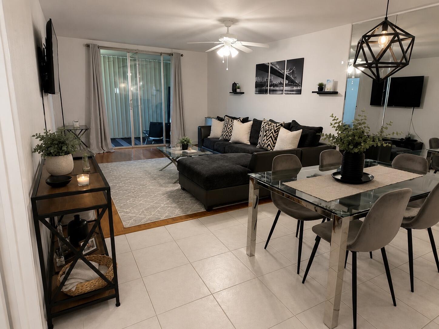 Welcome Home to Boca Teeca - An All-Ages Community Offering Boca Living at Its Finest!  This well-maintained first-floor condo offers comfort, convenience, and an unbeatable East Boca location. The building and grounds are beautifully maintained, creating a welcoming atmosphere from the moment you arrive.  The kitchen has been updated with contemporary cabinetry and beautiful quartz countertops, providing a stylish and functional space for everyday living. Throughout the home, you'll find a combination of laminate and tile flooring.  The spacious primary suite is filled with natural light and features a large walk-in closet. Enjoy relaxing on the large screened-in patio with shutters, offering the perfect space to unwind. The HOA includes cable, internet, water, and secure lobby entrance.