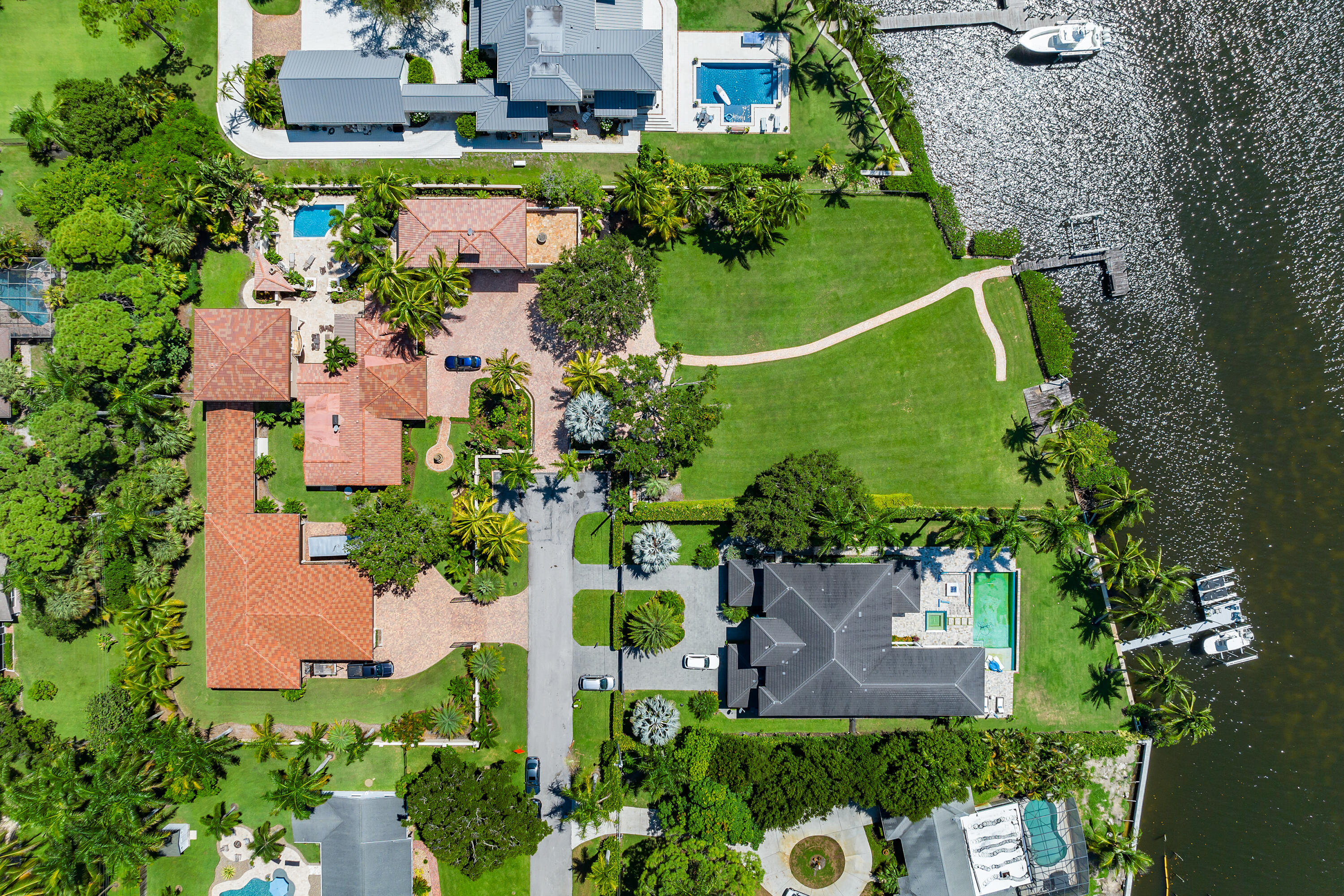 One of the largest lots within the perimeter of Pennock Point at 1.6 acres. Private, secluded, completely walled/fenced with gated access, located at the end of the street. Deeper water relative to some of the point lots, making the lift closer to the lands edge. Unincorporated, Palm Beach County overlay. Southerly oriented, facing the wide water views. Come see all the property has to offer you.