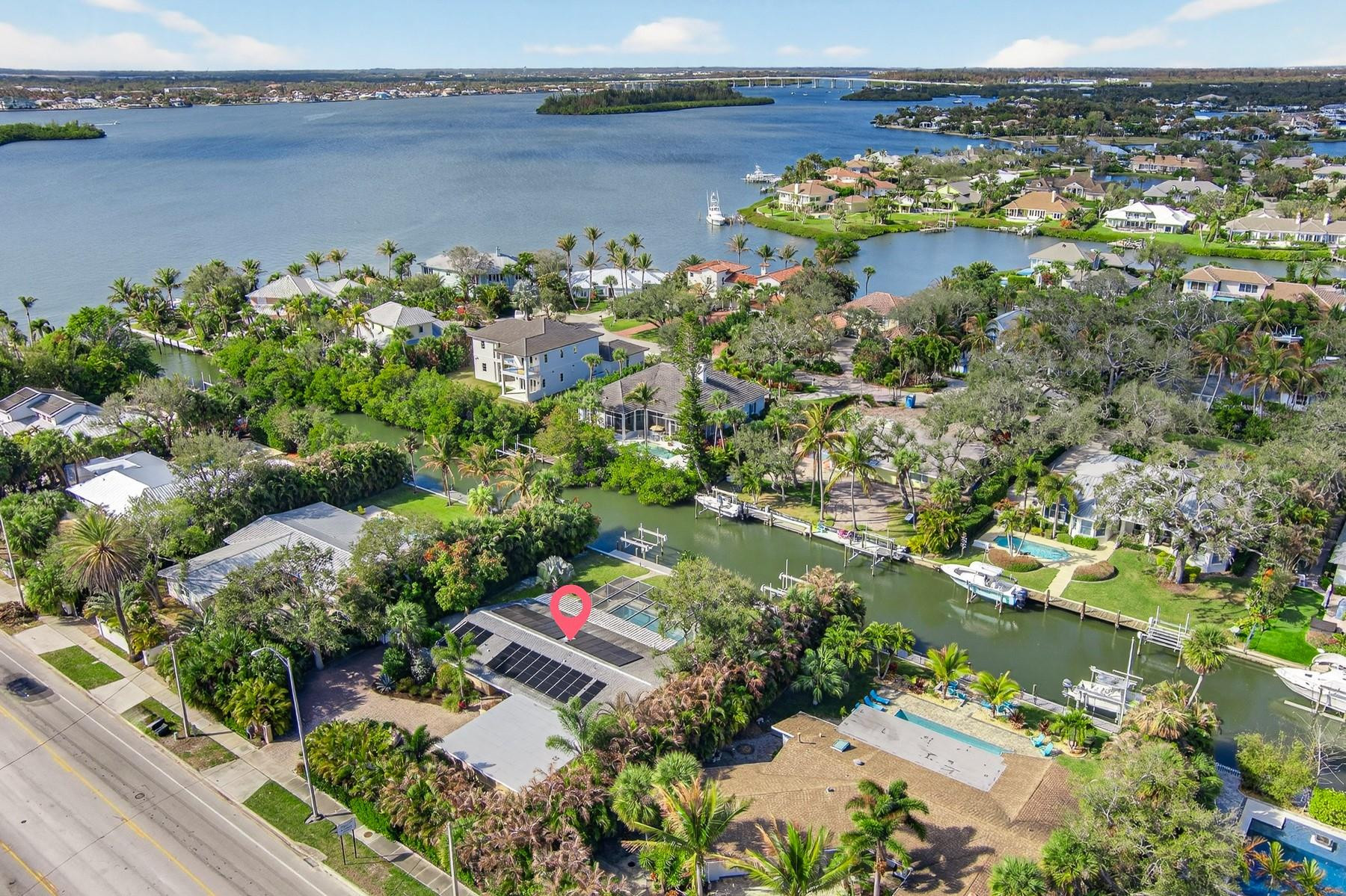 The lowest-priced 3+ bedroom river-access home in Vero, this surprisingly quiet riverfront property offers a rare opportunity to own nearly half an acre on the water with major upgrades already completed. Impact windows/doors, custom privacy wall, & mature landscaping enhance privacy & act as a buffer from the outside world. 5-bed, 3-bath with flexible layout, renovated in-law suite (private entrance), & updated kitchen. 32x15 pool, 2024 AC/water heater, updated electrical/plumbing & new dock with lifts. Fenced yard. Amazing location mins to the beach, Ocean Drive, shopping & top-rated schools.