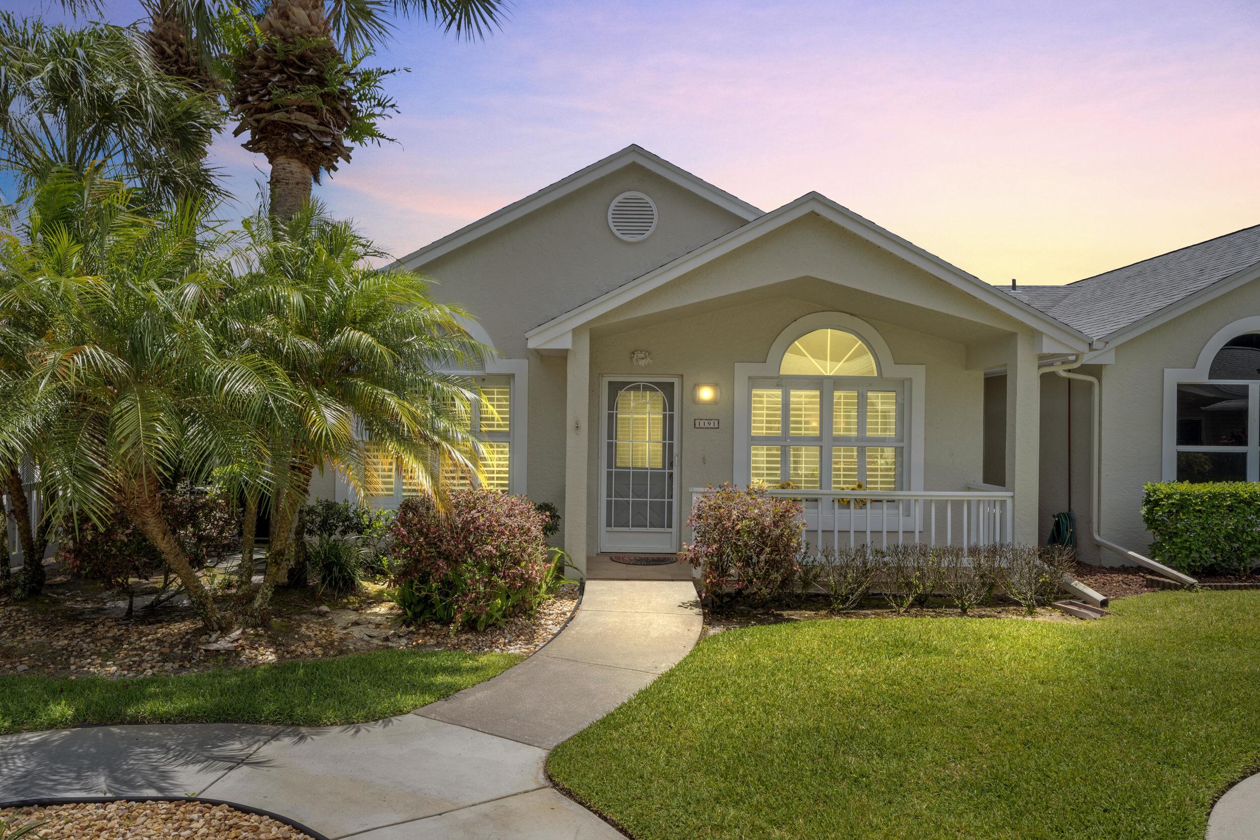 Live the resort lifestyle in one of Florida's Top 5 most sought-after 55+ communities! This pristine Kings Isle residence offers the low-maintenance ease of a villa with the privacy of a standalone single-family home. Move-in ready, it delivers ultimate peace of mind with a brand-new A/C (2024), a young roof (2021), and accordion shutters. The highly desirable floor plan functions like a dual primary suite setup, featuring walk-in closets in both bedrooms and an adjoining door to the second bath. Storage is a breeze with a dedicated kitchen pantry! The open layout boasts consistent wood-look laminate flooring for low maintenance, plantation shutters, high ceilings with elegant crown molding, and a white kitchen with stainless appliances and gas range. Most furniture is negotiable! Enjoy outdoor living on your large screened lanai. The active adult community features a clubhouse, sparkling pool and spa, gym, and over 40 social clubs with an activity director. Conveniently located next to shopping, dining, and Martin ER, you don't want to miss this one!