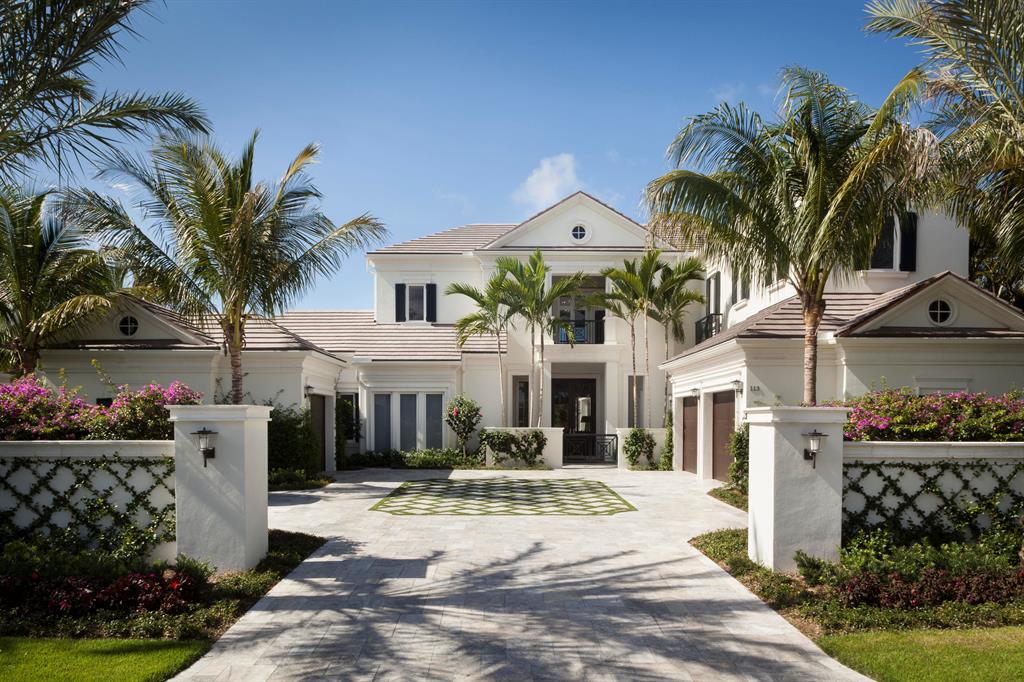 Built in 2014, this breathtaking home inside the pristine gates of Admirals Cove is truly one of a kind, with long water views in the back and golf and lake views in the front. As you enter through the front door, you are greeted by the light and airy, spacious living room that is perfect for entertaining guests or simply relaxing in your private oasis, enjoying the water view. The large kitchen includes marble countertops, two dishwashers, two ice makers, two refrigerators and freezers, 3 Wolf ovens, and a wine fridge. On the first floor, you will enjoy the convenience of a large master bedroom, which overlooks the pool and waterway. Enjoy the privacy of remote darkening shades or the bright, natural light. Built in 2014, this breathtaking home inside the pristine gates of Admirals Cove is truly one of a kind, with long water views in the back and golf and lake views in the front. As you enter through the front door, you are greeted by the light and airy, spacious living room that is perfect for entertaining guests or simply relaxing in your private oasis, enjoying the water view. The large kitchen includes marble countertops, two dishwashers, two ice makers, two refrigerators and freezers, 3 Wolf ovens, and a wine fridge. On the first floor, you will enjoy the convenience of a large master bedroom, which overlooks the pool and waterway. Enjoy the privacy of remote darkening shades or the bright, natural light...

...You will feel like you are on your own personal resort getaway with the breakfast bar, you won't even need to leave your room to enjoy your morning cup of coffee! The large bathroom with his and her toilets connects to a gorgeous, custom walk-in closet. Also located on the first floor is a beautifully decorated guest room and a custom office with pool and waterway views. The office includes a large built-in desk and cabinets with herringbone wood floors. As you walk up the stairs to the second floor or take the elevator, there are three large guest suites, a second laundry room, and a lounge area, which includes a TV, refrigerator, and sink. Large sliding glass doors lead your guests to a covered balcony that overlooks the pool and waterway. Enjoy the beauty of South Florida in your large pool and spa or your outdoor seating area fully equipped with a fireplace, grill, ice maker, fridge, bathroom, and outdoor shower. This home in Admirals Cove is truly unique, from the professionally designed details by Lorraine Rodgers, Smart house features throughout, generator, impact windows  you will not find it difficult to call this residence your home. Required golf membership purchase conveys all the first-class amenities of Admirals Cove including two spectacular clubhouses, 45 holes of golf, 5 restaurants, 58 slip marina with floating docks, Yacht Club, 11 har tru tennis courts, 5 pickleball courts, state of the art fitness, 21,000 sq ft brand new spa & salon, Covesters kids club and Platinum service.